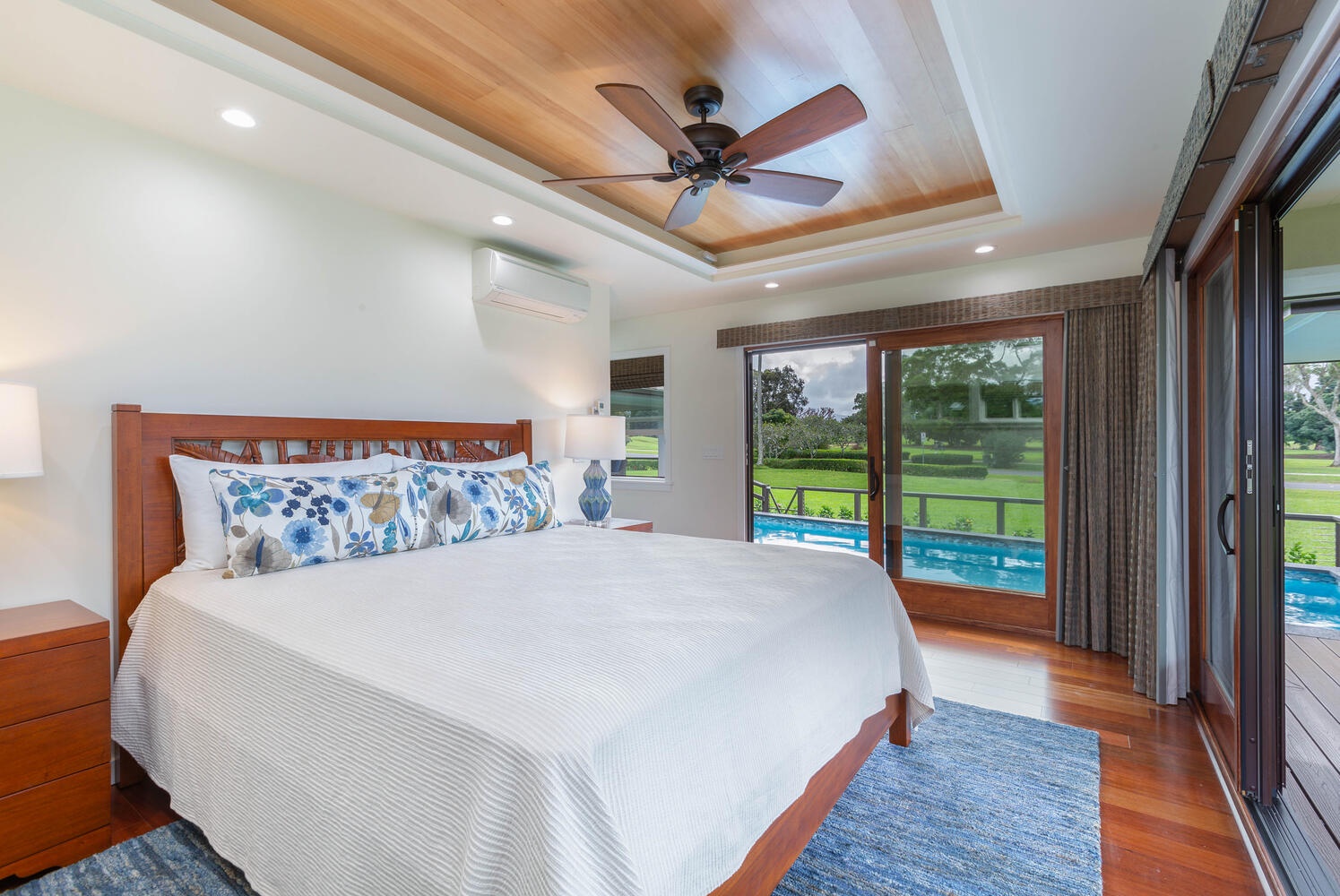 Princeville Vacation Rentals, Aloha Villa - Primary Bedroom with King bed and amazing views of the nature and Pool