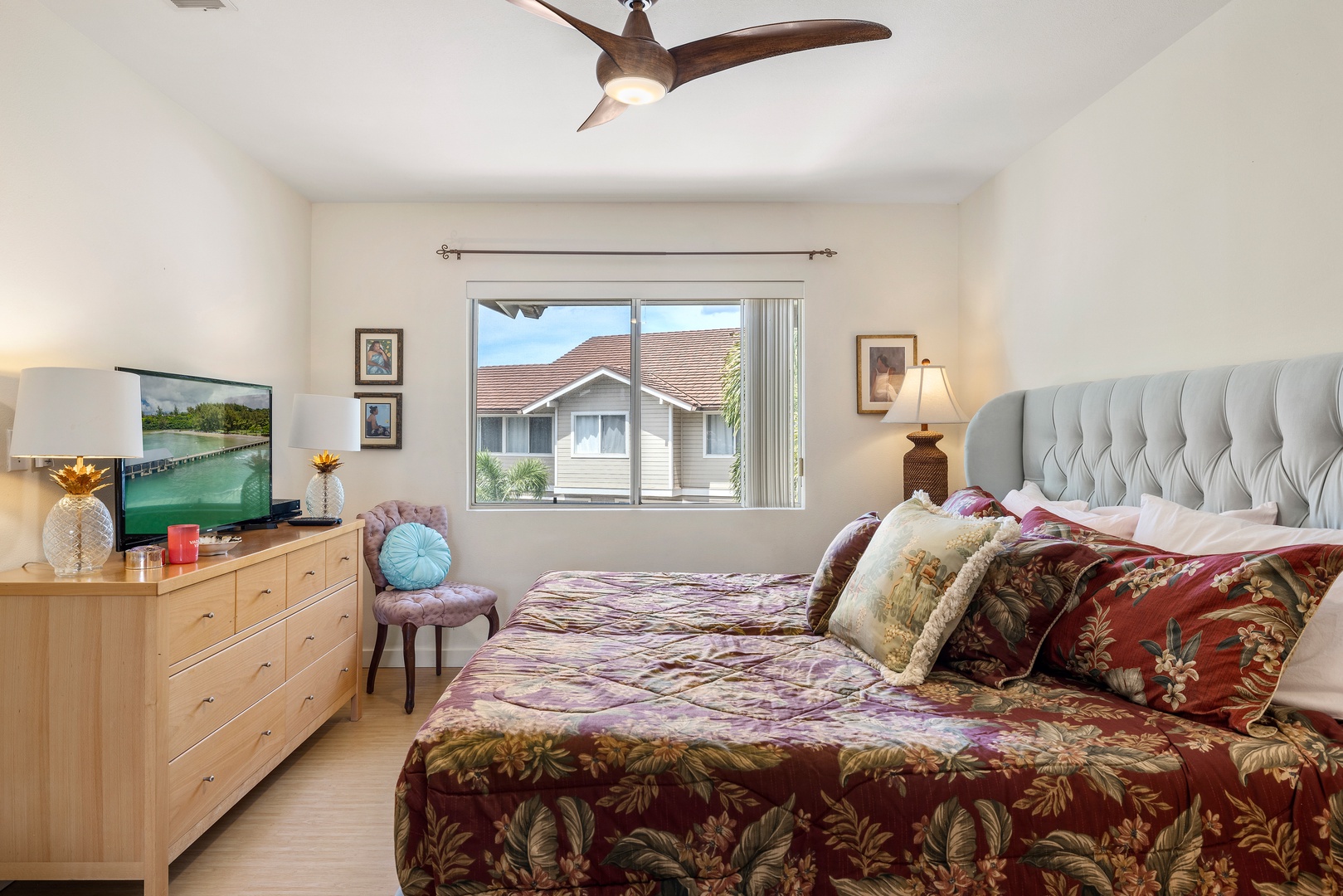 Settle into your cozy bedroom where tropical breezes from the ceiling fan create the perfect sleeping temperature while you enjoy shows on the flatscreen TV.