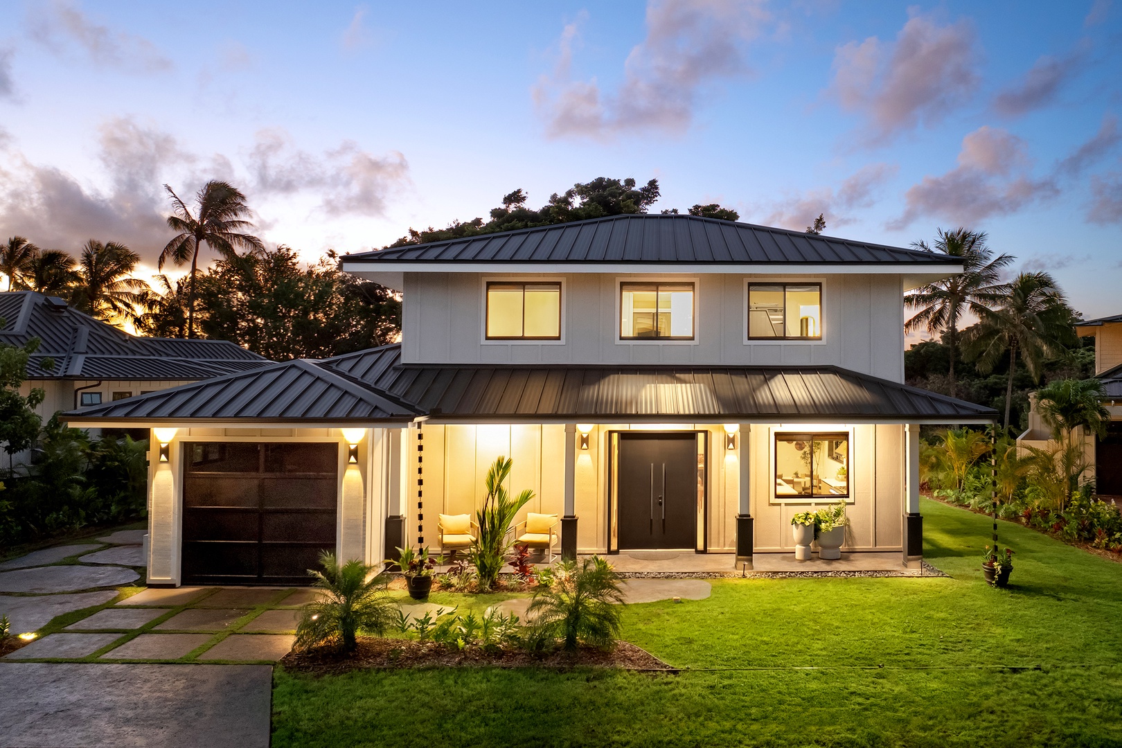 Koloa Vacation Rentals, Ka Hui Ana at Kukuiula - Front exterior of the property with a welcoming design and manicured lawn.