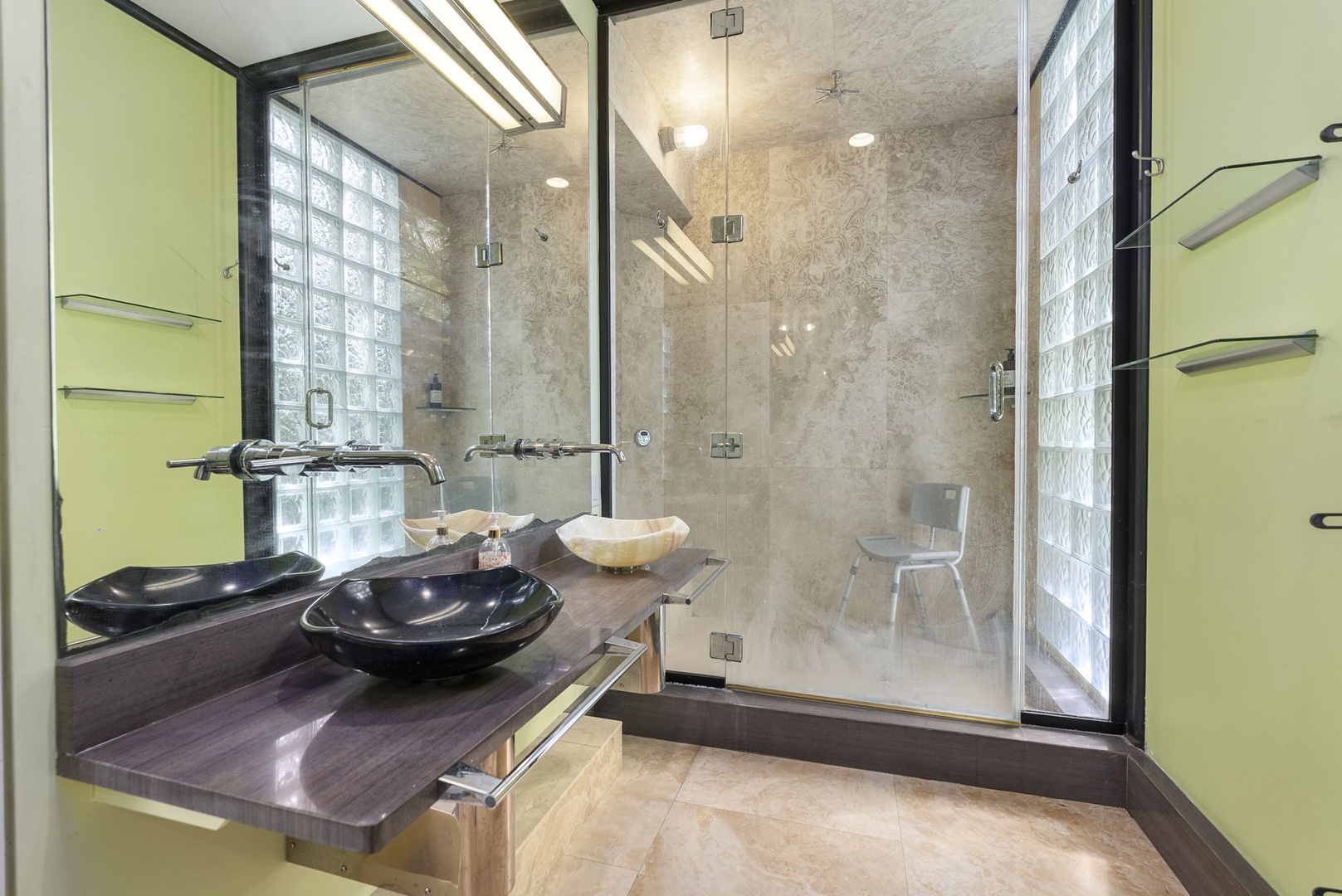Honolulu Vacation Rentals, Tantalus Glass House (3 BD) - Indulge in your sleek modern bathroom featuring dual vessel sinks and a spacious glass-enclosed shower with natural light streaming through glass block windows.