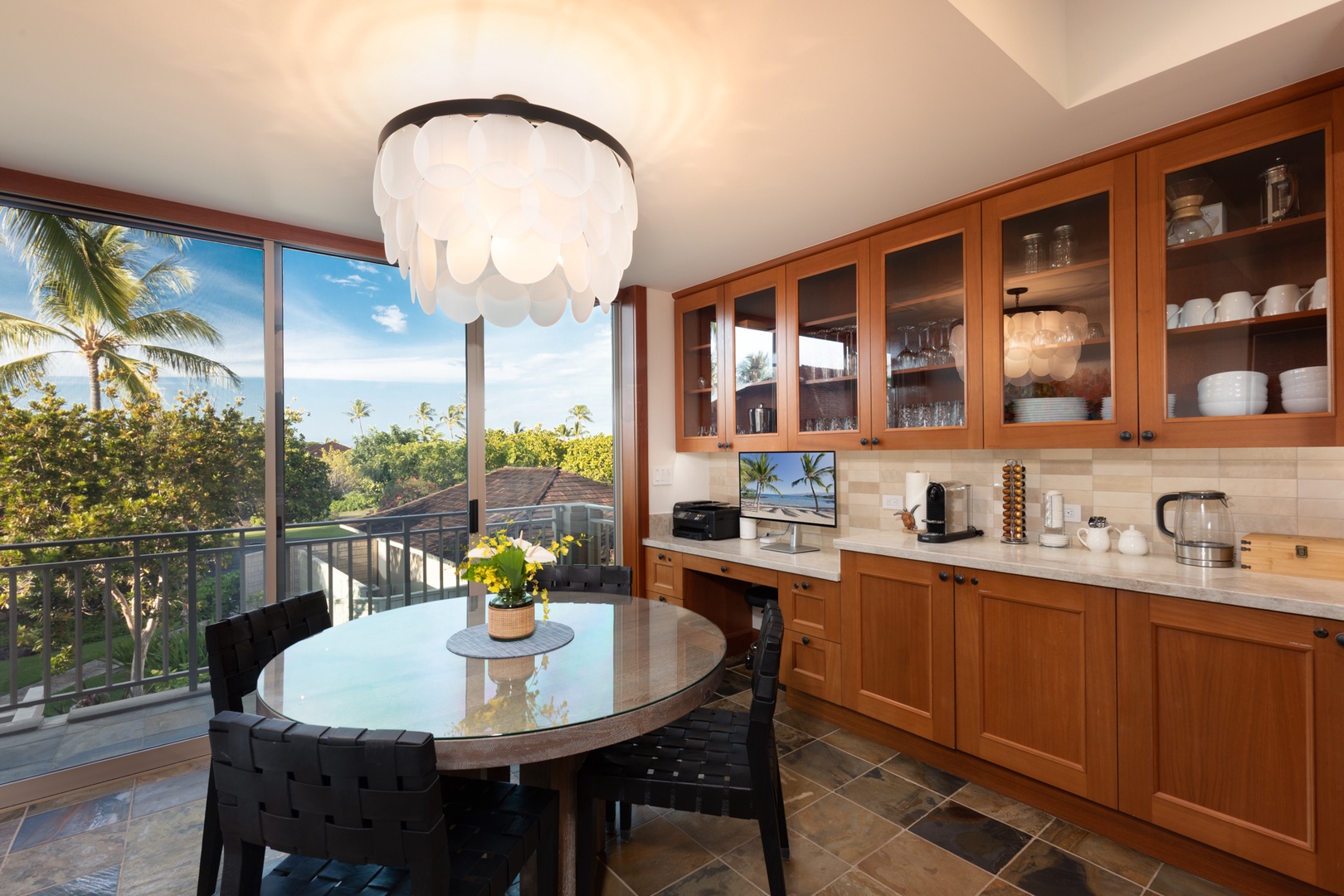Kailua Kona Vacation Rentals, 3BD Waiulu Villa (111D) at Hualalai Resort - Your tropical kitchen paradise awaits, where warm wood cabinetry frames stunning palm-studded views. Cook and dine surrounded by paradise through floor-to-ceiling windows.