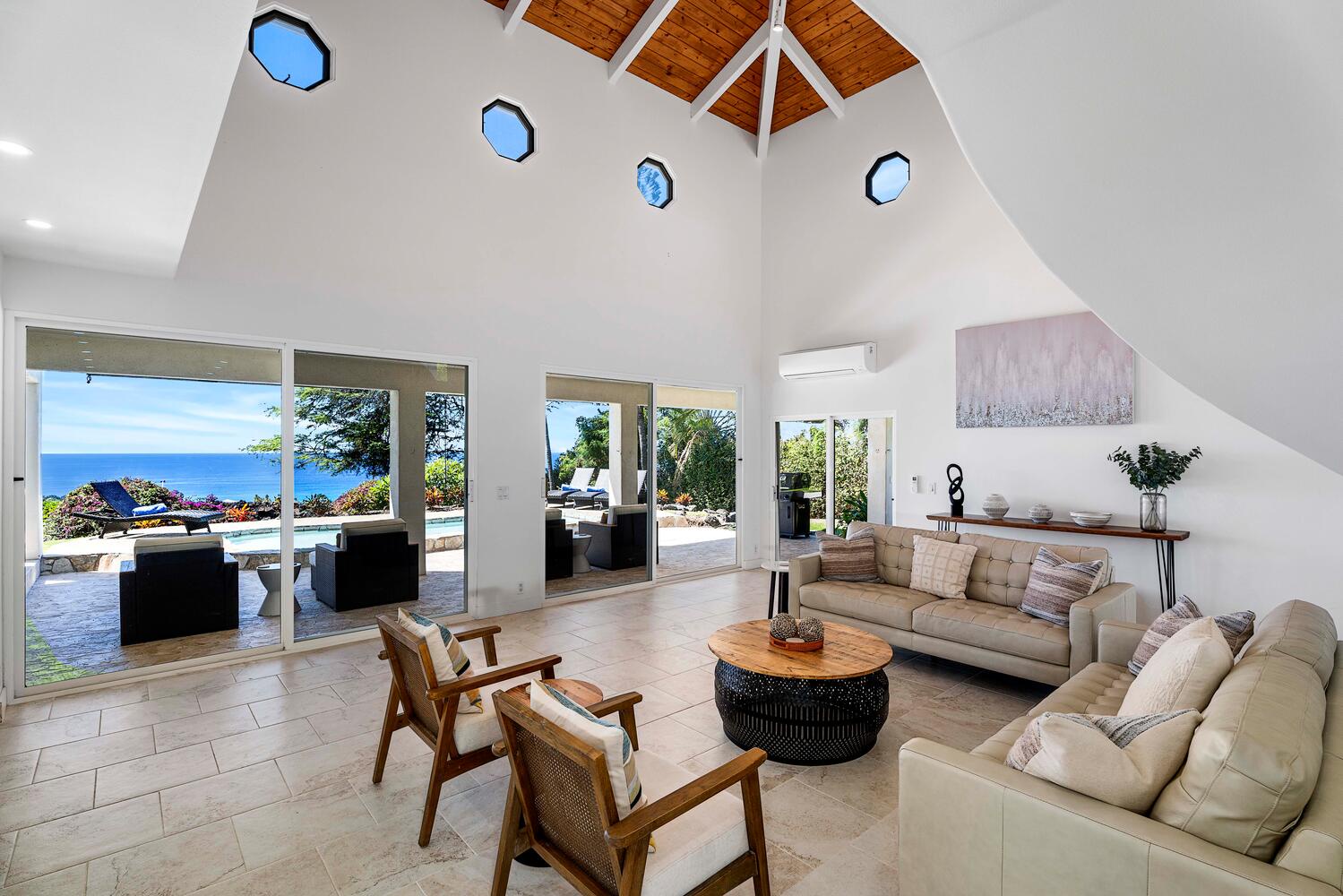 Kailua Kona Vacation Rentals, Ho'okipa Hale - Experience the grandeur of vaulted ceilings and sunlit interiors in the spacious living area.