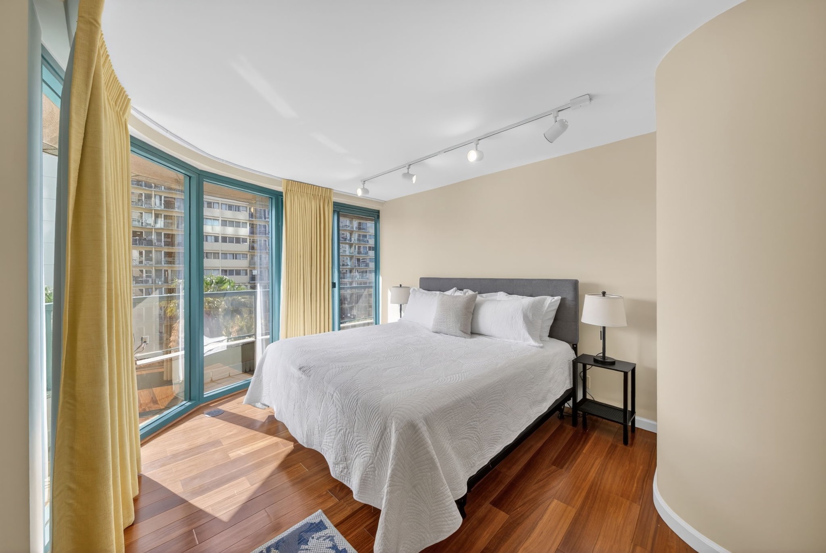 Honolulu Vacation Rentals, Island View at Waikiki Landmark - Drift off in this peaceful bedroom with oversized windows and private lanai access.