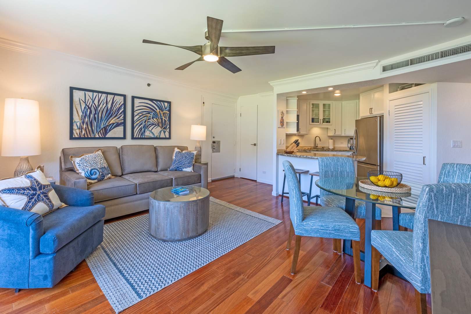 Lahaina Vacation Rentals, Kaanapali Shores 213 - The open-concept living area offers a comfortable space to relax, with seamless flow between the kitchen, dining, and lounging areas.