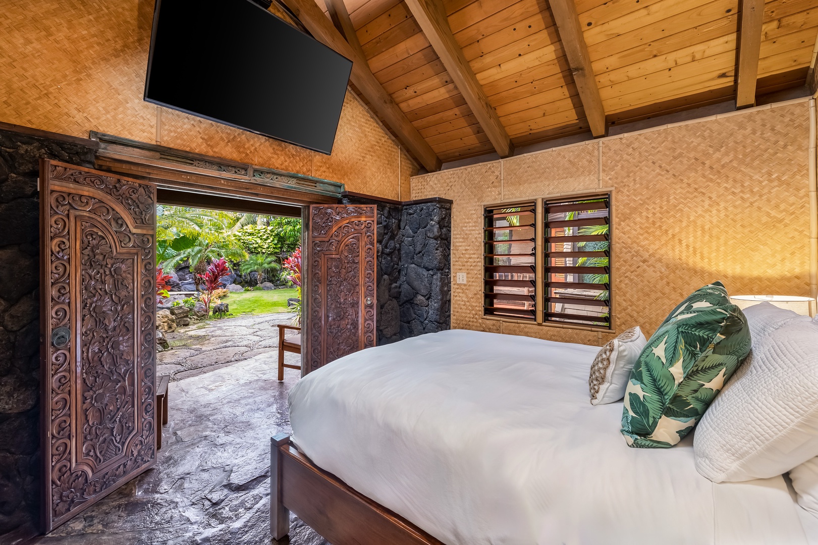 Waimanalo Vacation Rentals, Hawaii Hobbit House - Guest house bedroom opens up to the backyard and private lanai