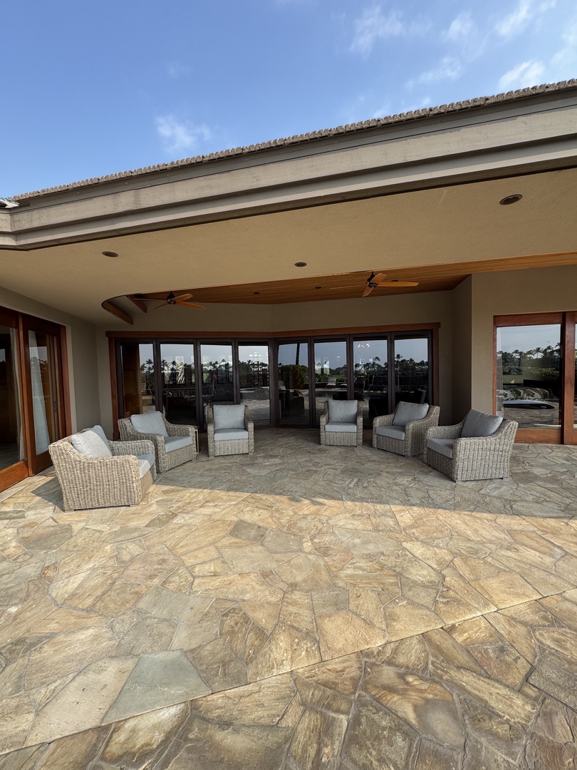 Kamuela Vacation Rentals, Hale Konane - Relax on the expansive lanai, the perfect spot for outdoor lounging and entertainment.