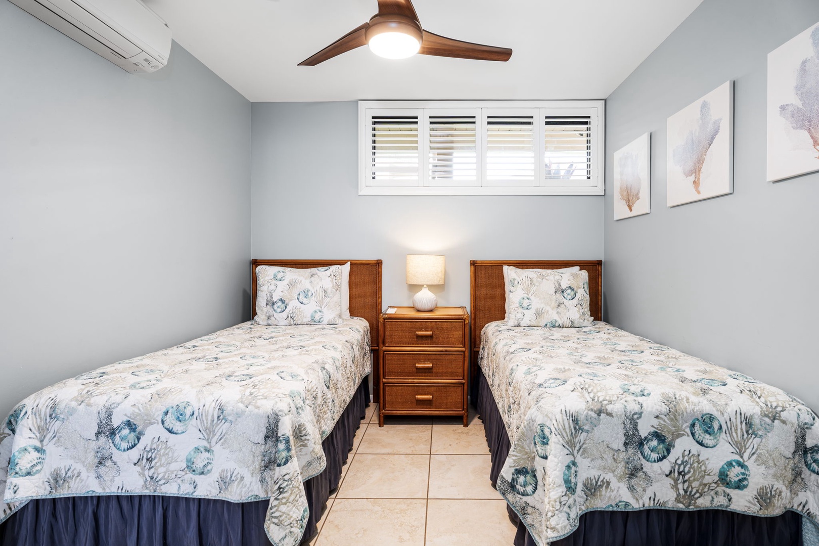 Kailua Kona Vacation Rentals, Sea Village 1105 - Twin bedroom offers flexible sleeping arrangements with crisp linens and cool A/C comfort.