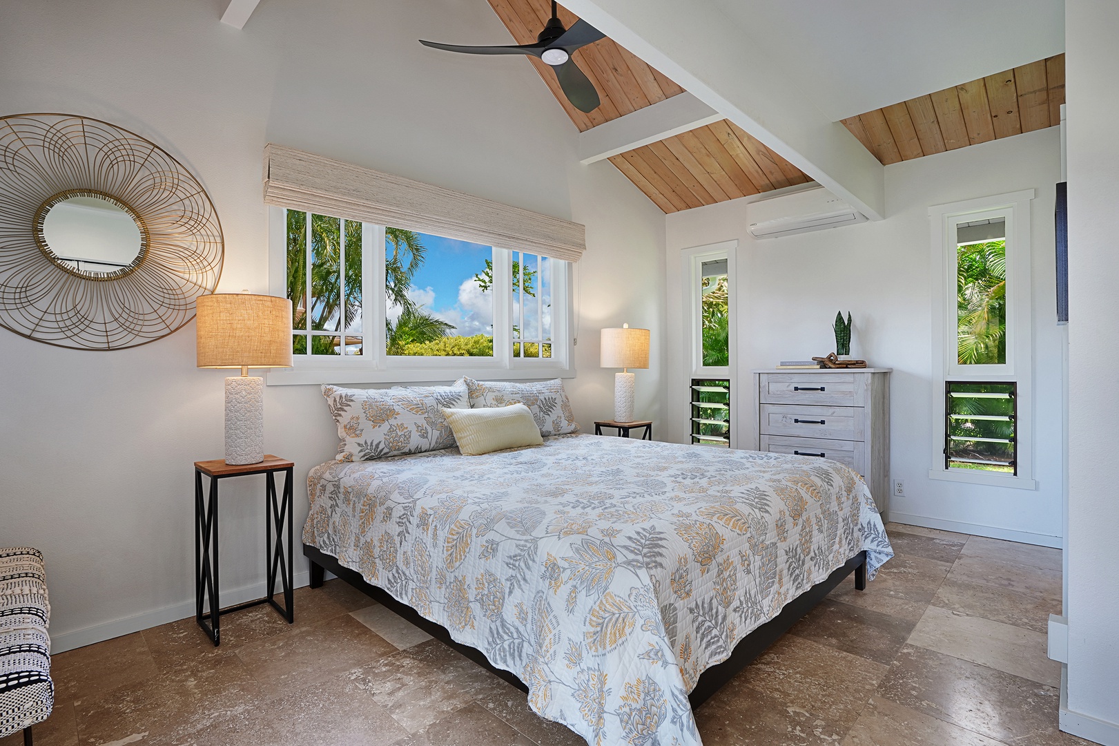 Princeville Vacation Rentals, Kaiana Villa - The Guest Bedroom is located downstairs and offers a king bed and tropical views