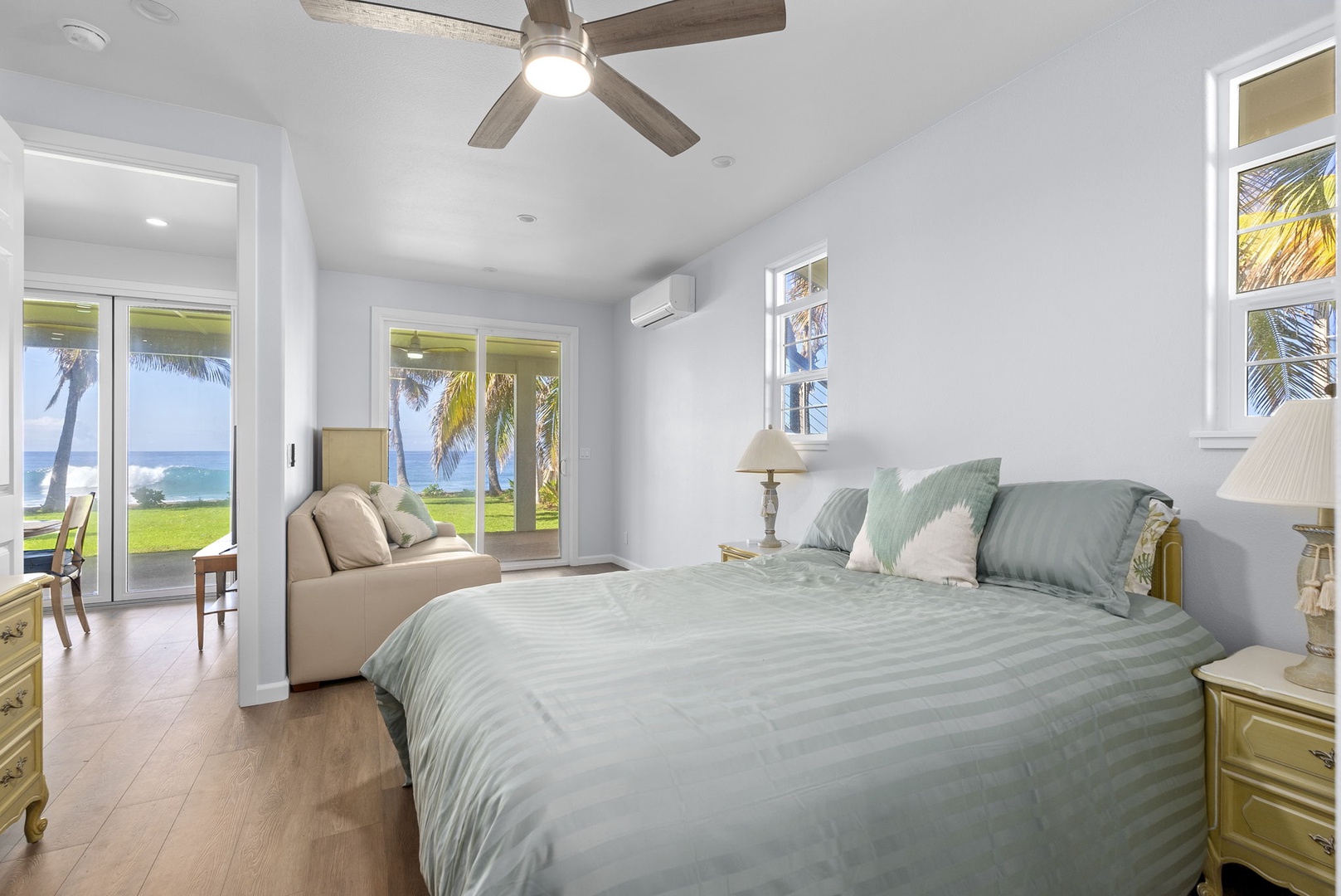 Waianae Vacation Rentals, Oceanfront Luxury Dream Estate - The second guest suite in the upper-level opens to the outdoors with large windows, soft greens, and modern island comfort.