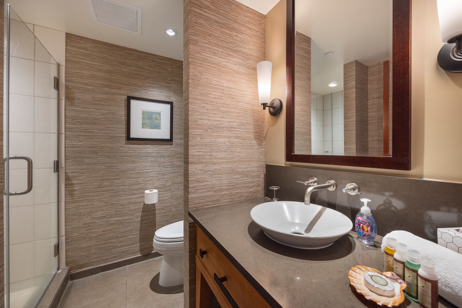 Kapolei Vacation Rentals, Ko Olina Beach Villas O1111 - Unwind in your beautifully appointed bathroom with elegant textures and modern amenities for a spa-like experience.