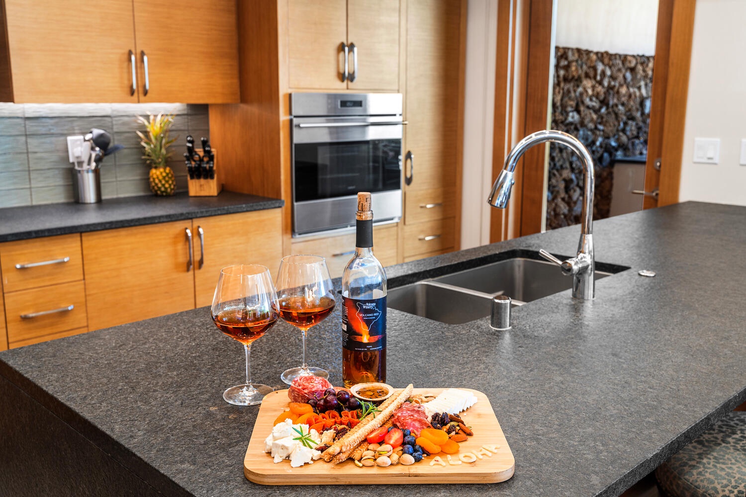 Kamuela Vacation Rentals, Laule'a at the Mauna Lani Resort #14 - Set the tone for the evening with drinks and pupus on the oversized kitchen island.