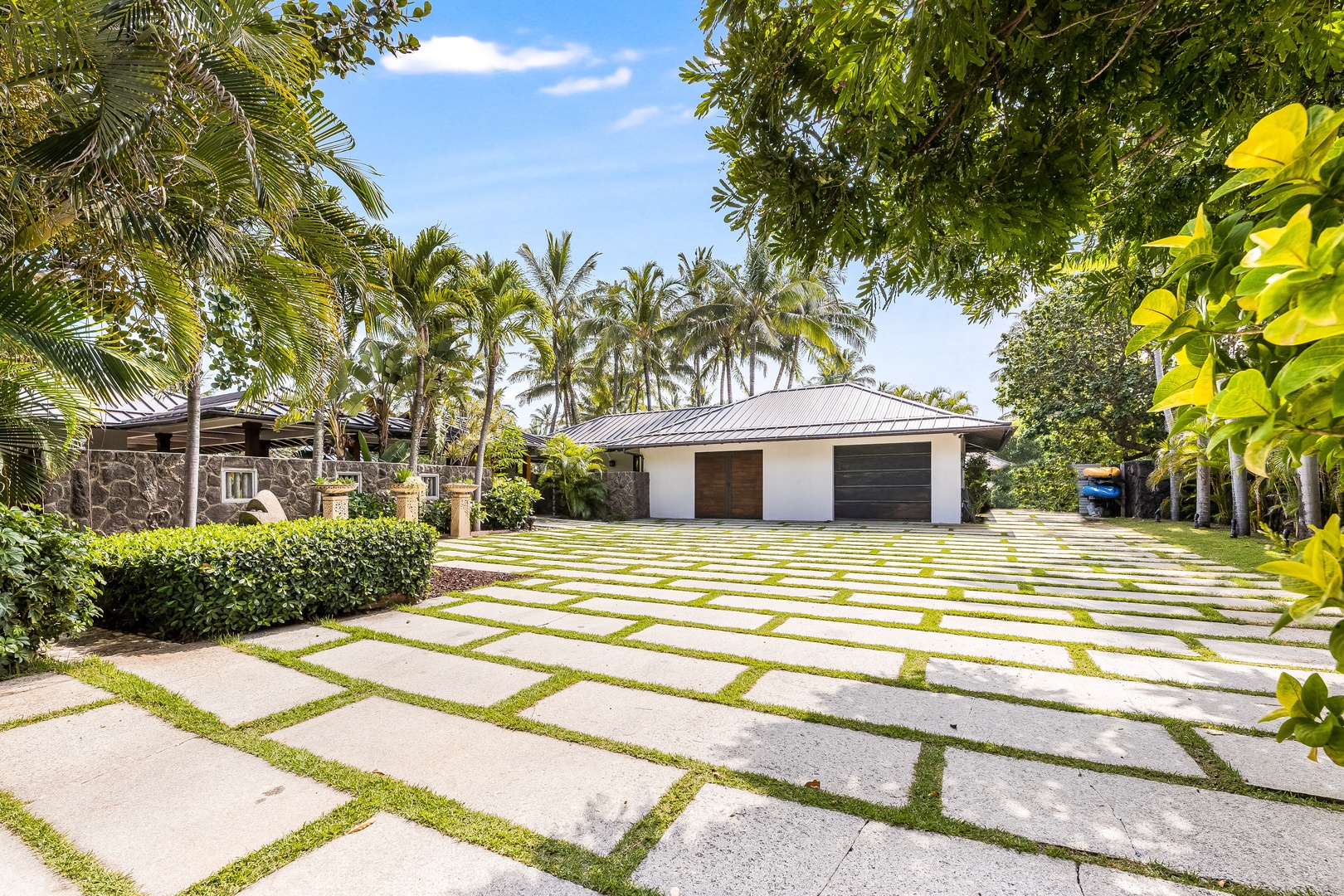 Kailua Vacation Rentals, Castle Point Estate - Ample driveway and guest parking surrounded by manicured palm-lined grounds.
