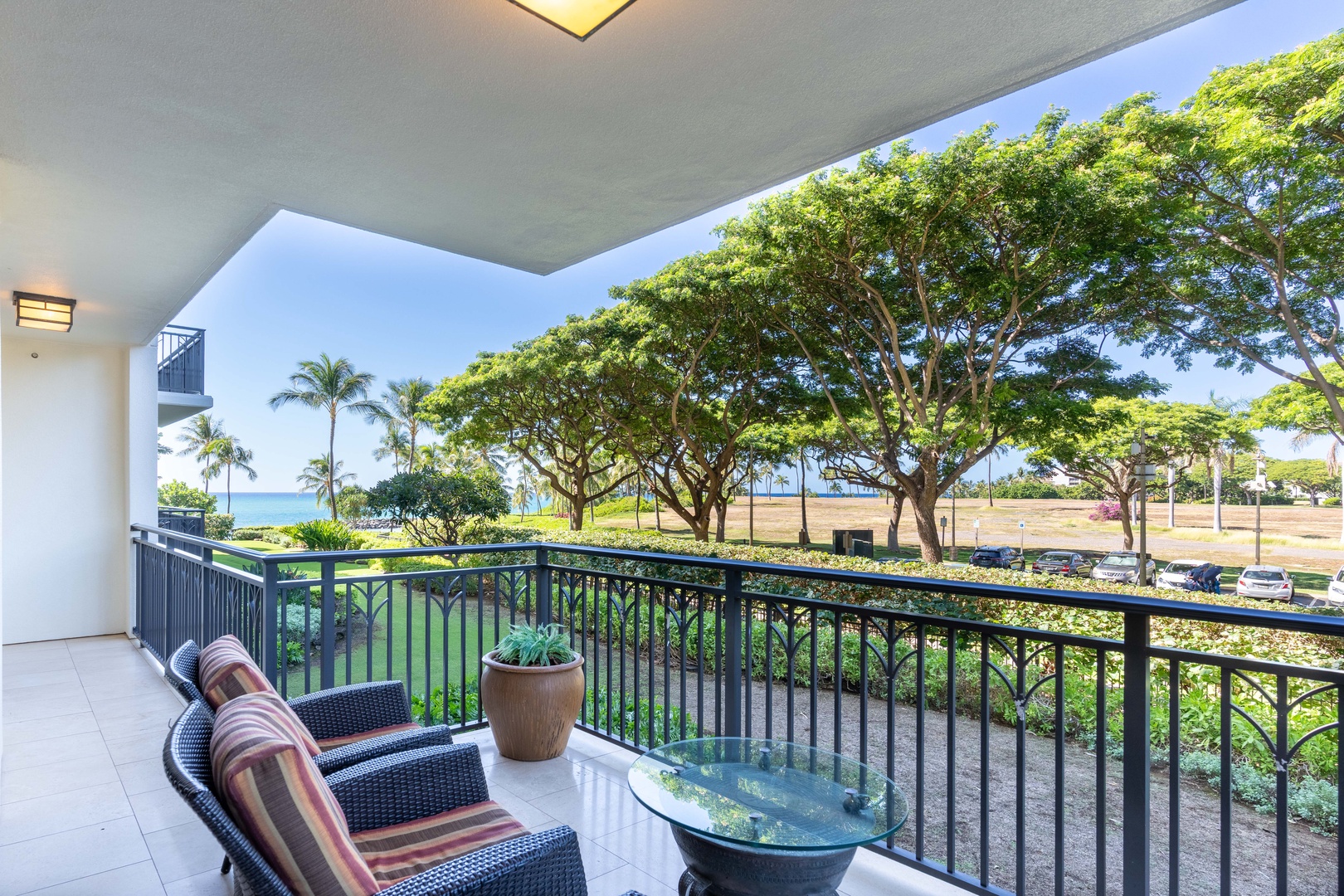 Kapolei Vacation Rentals, Ko Olina Beach Villas B202 - A beautiful island view from the lanai with ocean breezes and tropical trees.