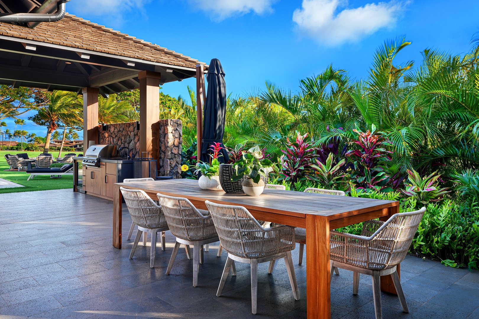 Koloa Vacation Rentals, Hale Pakika at Kukui'ula - Al fresco dining on the patio at sunset is the perfect time to recap the island day's exploration.