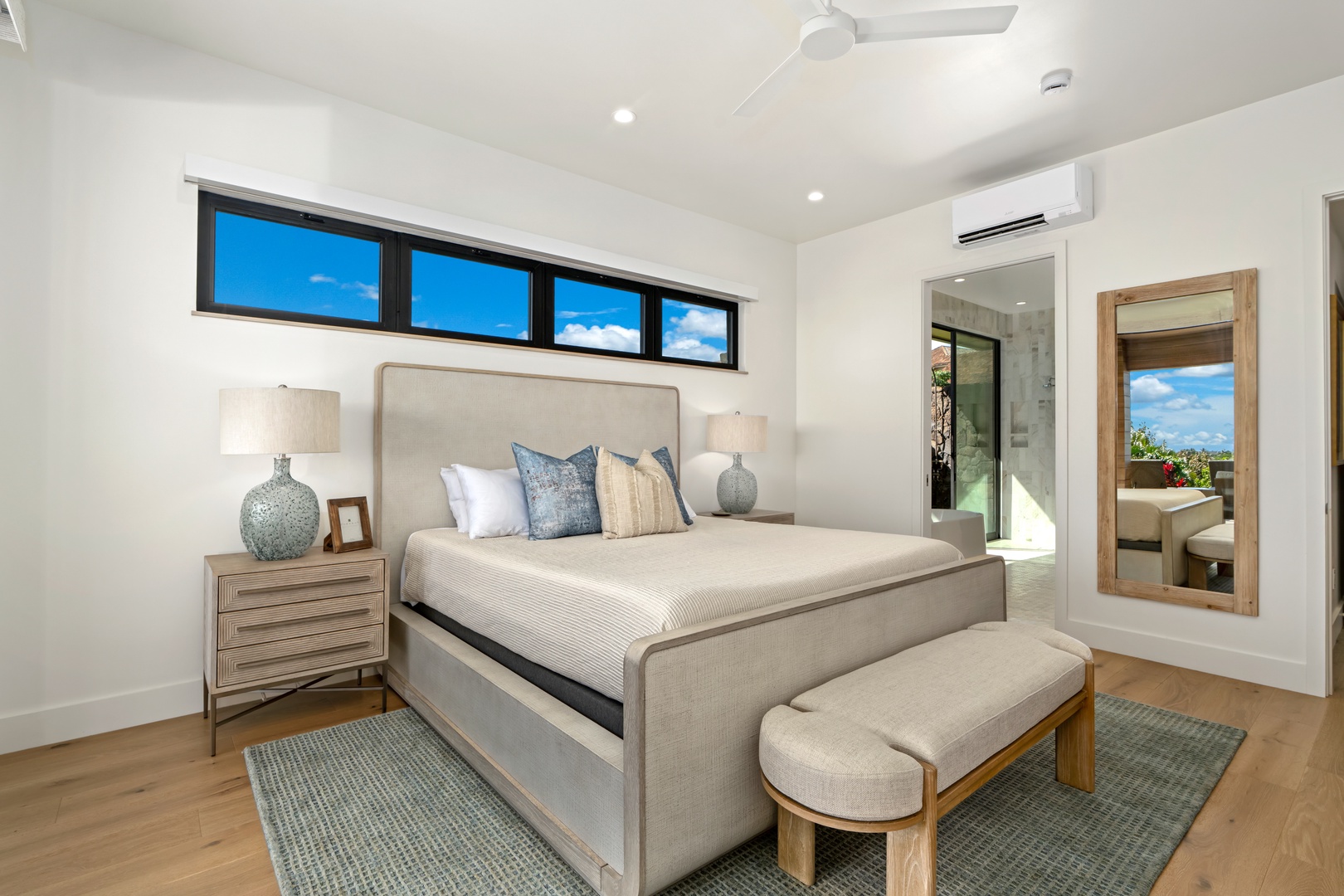 Koloa Vacation Rentals, Hale Laule'a at Kukui'ula - Drift off in your serene bedroom with stunning blue sky views through sleek windows, soft linens, and modern comfort.