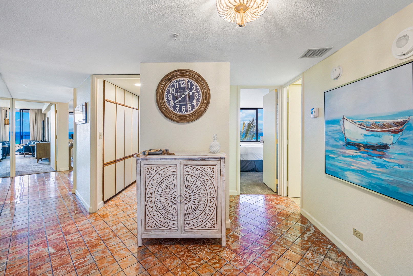 Lahaina Vacation Rentals, Kaanapali Shores 502 - This bright and welcoming entryway sets the tone for your stay with its tasteful decor and soothing island vibe. The decorative accents and tiled floors create a warm, tropical ambiance