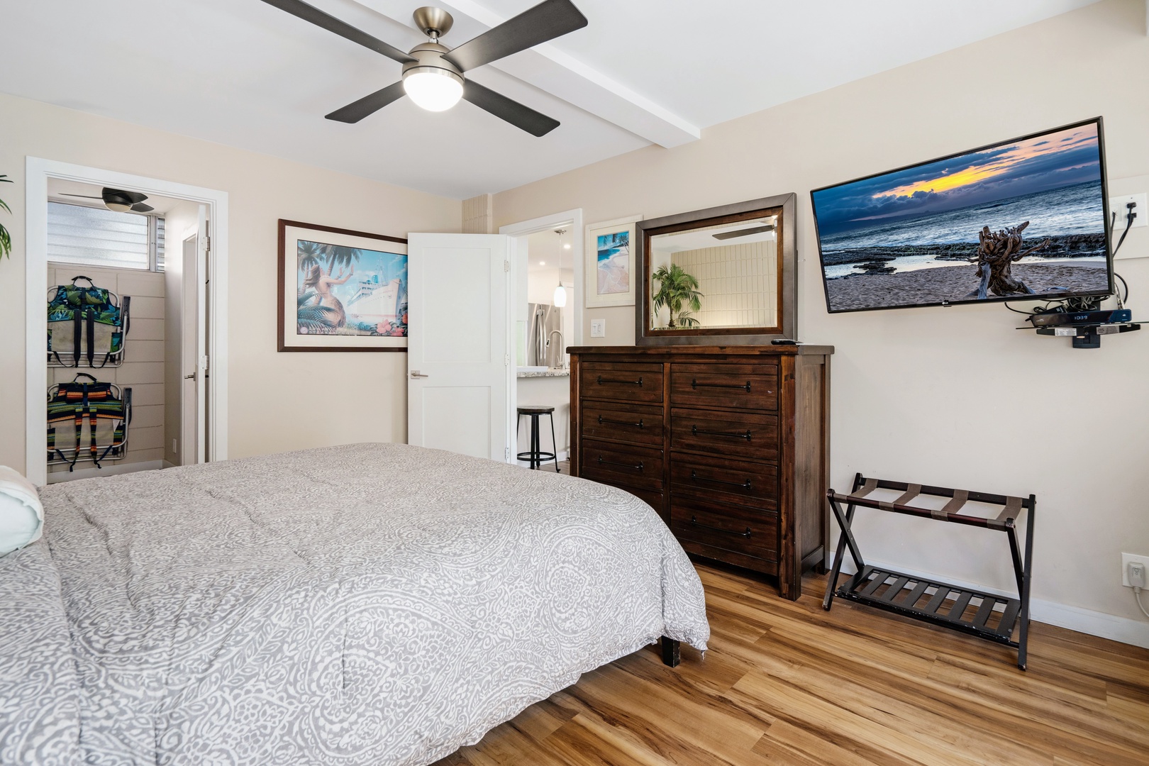 Kihei Vacation Rentals, Haleakala Shores A206 - Wall-mounted TV in view of the bed, for nights when the whole plan is takeout and a movie.
