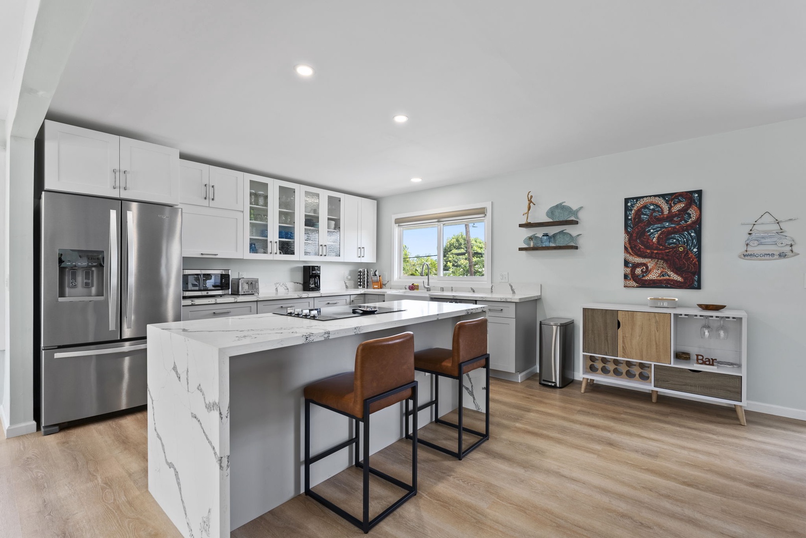 Kailua Vacation Rentals, Hale Alapi'i Lanikai Getaway - This modern kitchen is equipped with top-notch appliances and a breakfast bar.