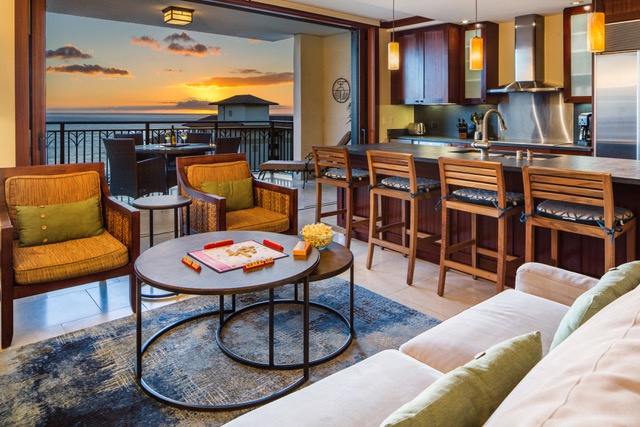 Kapolei Vacation Rentals, Ko Olina Beach Villas O1406 - The living area with direct access to the lanai and views.