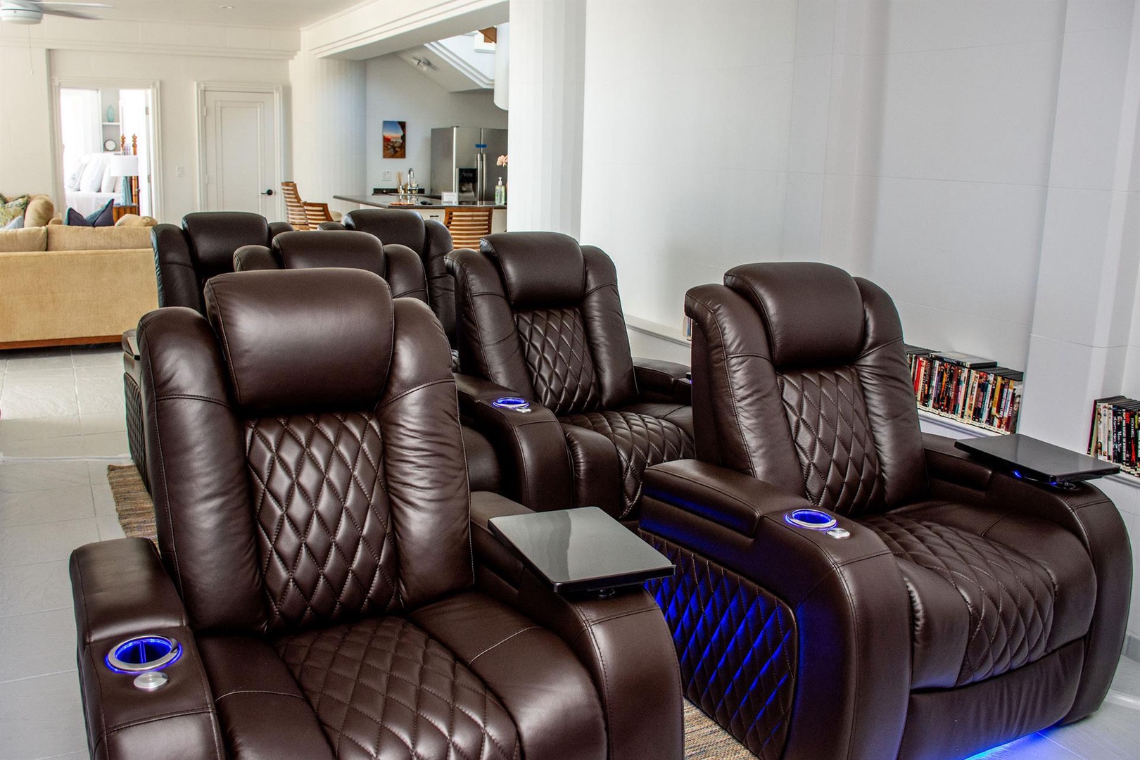 Ninole Vacation Rentals, Waterfalling Estate** - Private theater with plush recliners and a large screen for an immersive viewing experience.