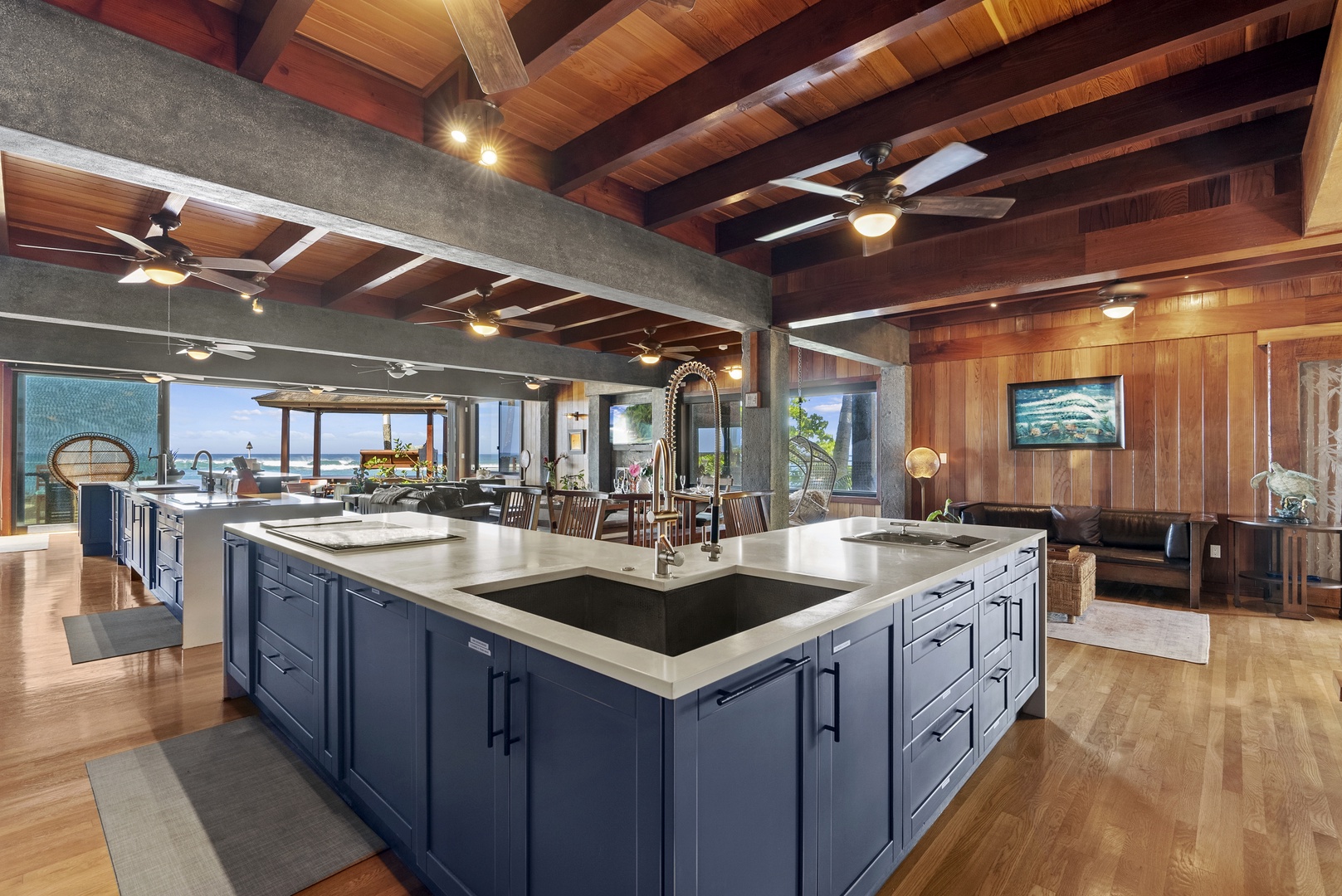 Haleiwa Vacation Rentals, Samurai House - Chef’s kitchen with a large island and ocean views for a dream cooking space with two stove tops.