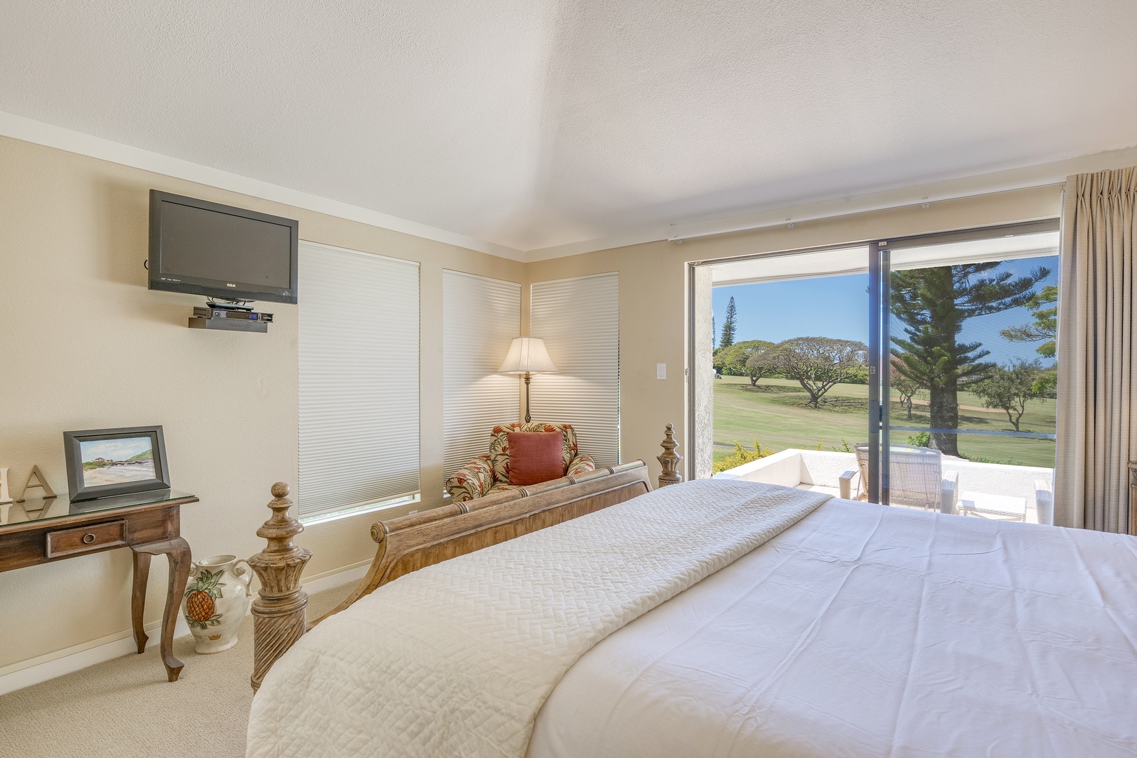 Lahaina Vacation Rentals, Kapalua Golf Villas 14P1-2 - The guest bedroom offers a peaceful retreat with soft tones and windows framing golf course scenery.
