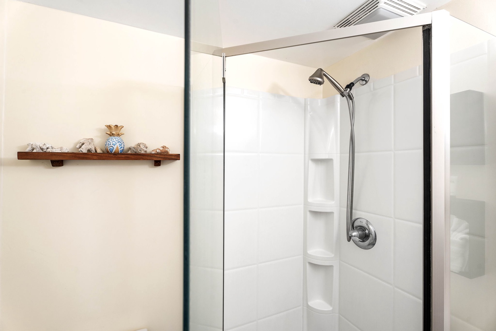 Kailua Kona Vacation Rentals, Kona Plaza 201 - Modern and sleek secondary bathroom with a spacious walk-in shower for comfort.