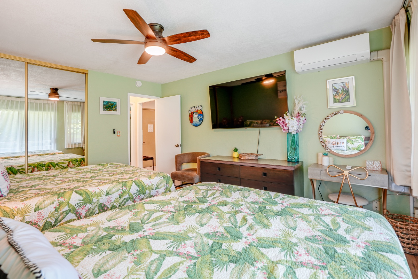 Kapaa Vacation Rentals, Nani Hale - Unwind at the end of the day with a 65” smart TV and cozy sitting space—your private retreat within the suite.