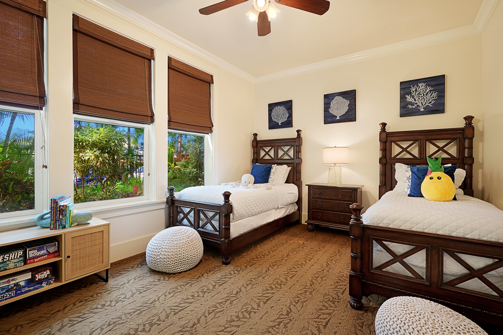 Koloa Vacation Rentals, Villas at Poipu Kai B111 - Cozy guest bedroom with twin beds and garden views, ideal for family or friends.