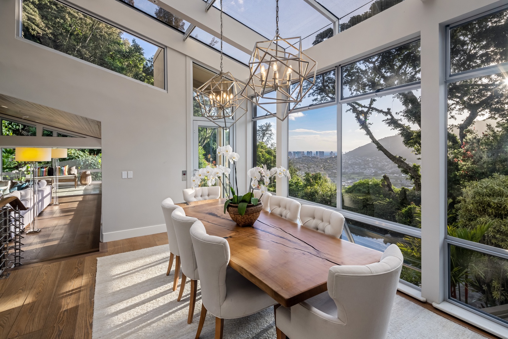Honolulu Vacation Rentals, Manoa Royal Retreat - Elegant dining room with vaulted glass ceiling and mountain-to-sea views—ideal for memorable meals together.