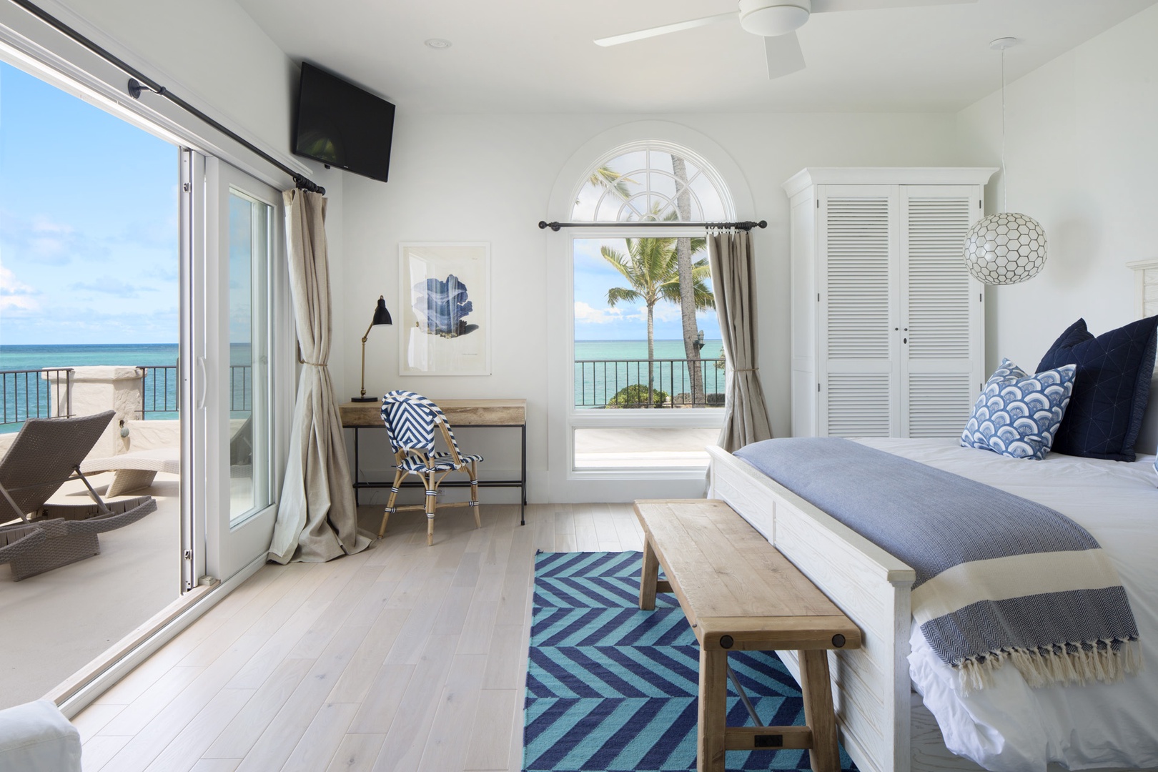 Kailua Vacation Rentals, The Villa at Wailea Point* - Guest bedroom with a king bed, access to lanai, TV and panoramic views.