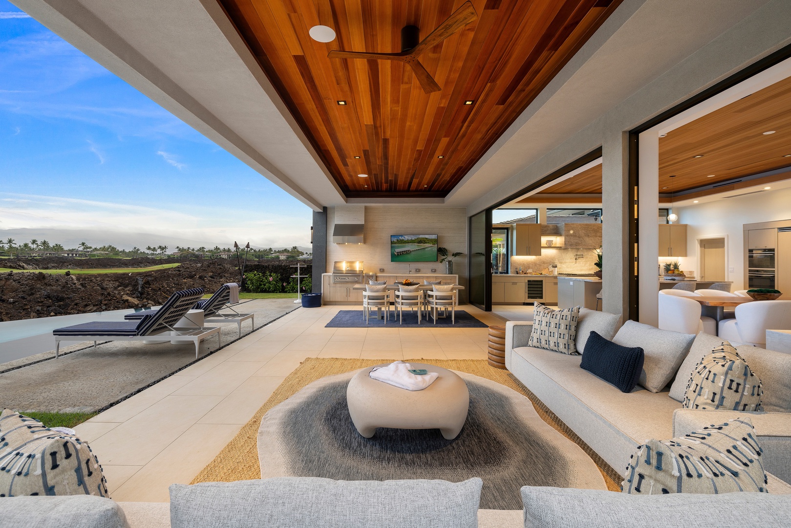 Kamuela Vacation Rentals, 6BD Mauna Lani Lux Golf Estate (6) at One Ocean - Open-air living comes naturally here, with comfortable seating, warm wood ceilings, and seamless indoor-outdoor flow.