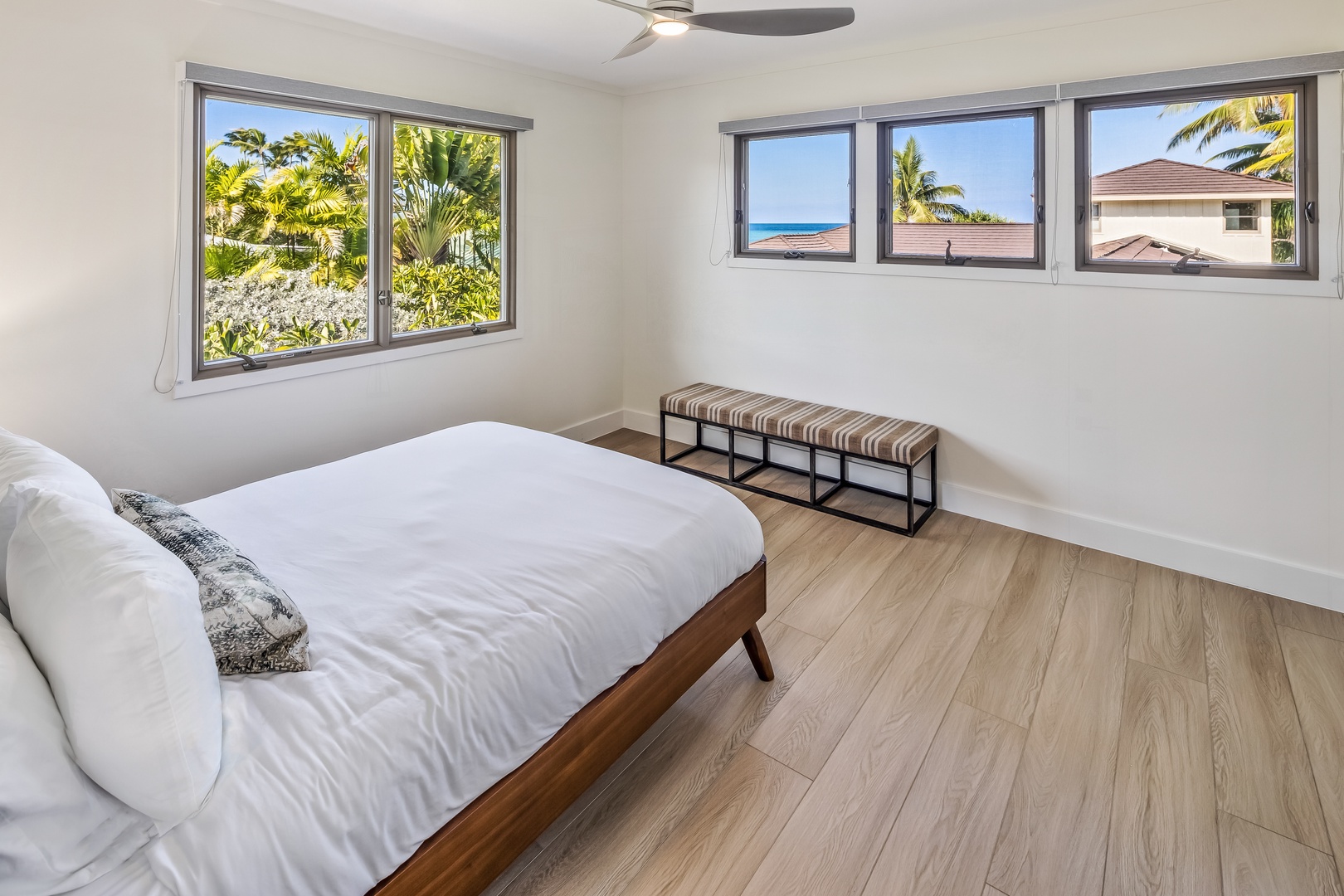 Kailua Vacation Rentals, Na Makana Villa - Guest Bedroom 5 with queen bed, partial ocean view, split AC, and ceiling fan