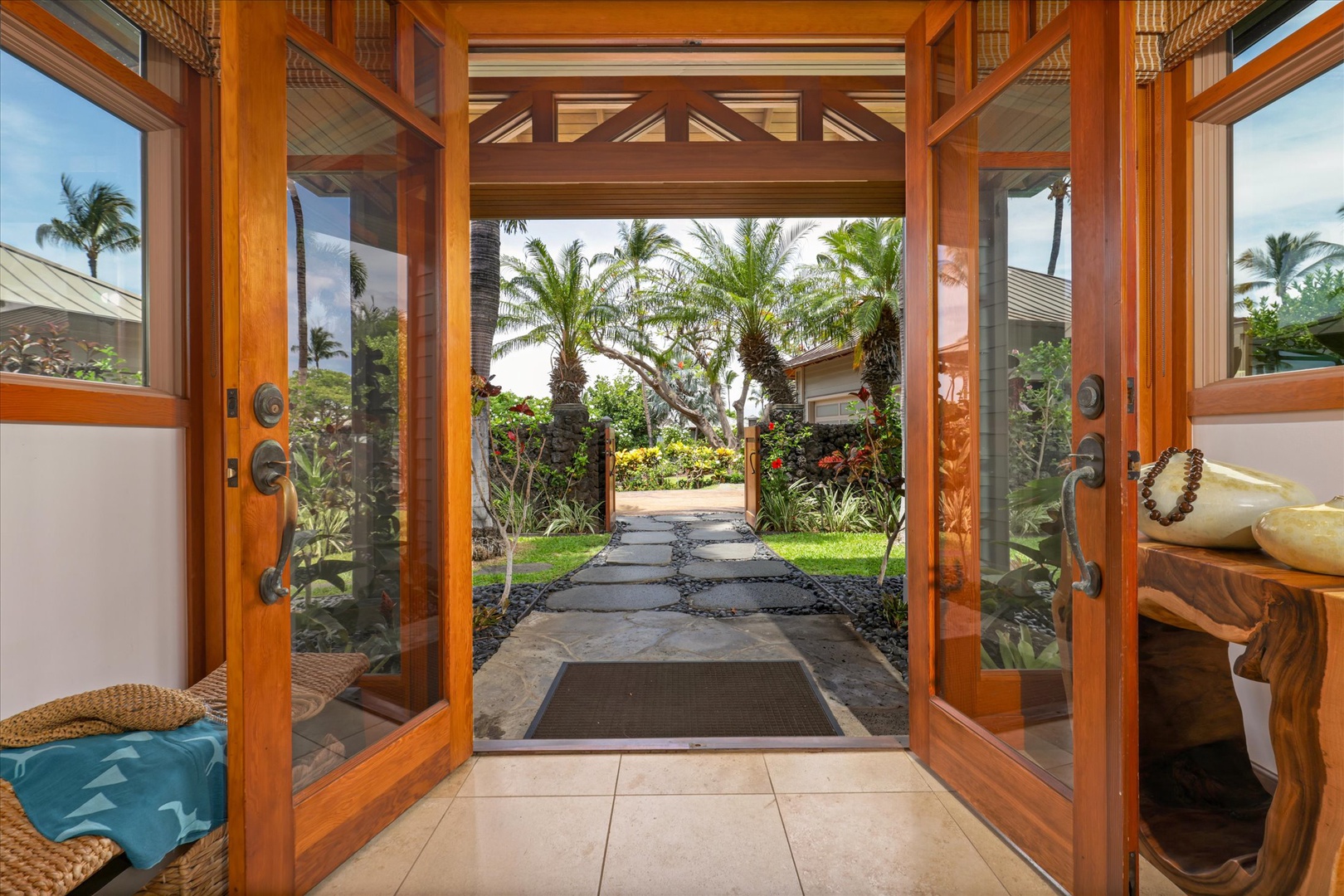 Kamuela Vacation Rentals, 3BD Na Hale 3 at Pauoa Beach Club at Mauna Lani Resort - Follow the palm-lined pathway and step through the open doors.