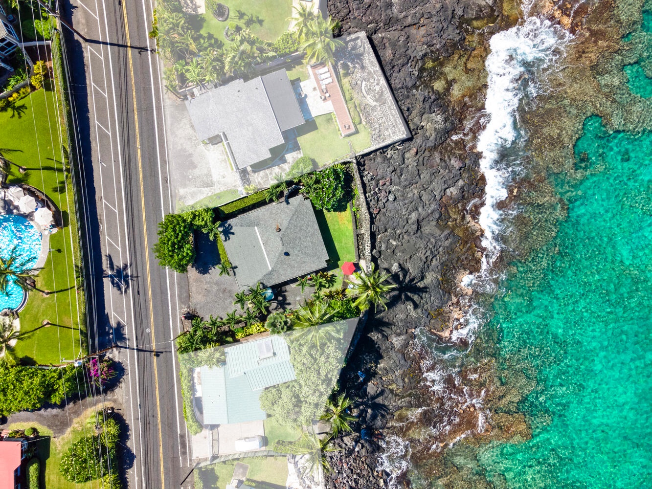 Kailua Kona Vacation Rentals, Honl's Beach Hale (Big Island) - Overhead perspective showing the property’s oceanfront placement.