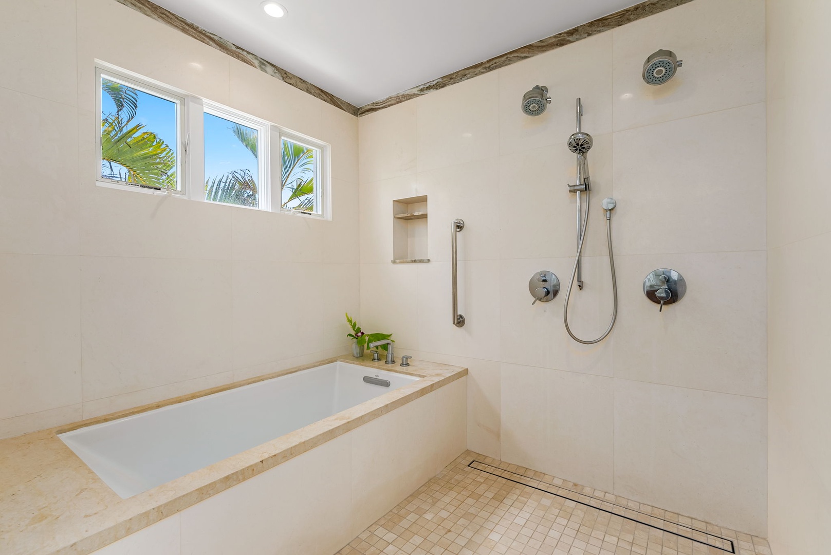Kailua Vacation Rentals, Lanikai Sunrise Estate - Soaking tub and rainfall shower offer a full bath experience ideal for families or wind-down time after long sun-filled days.