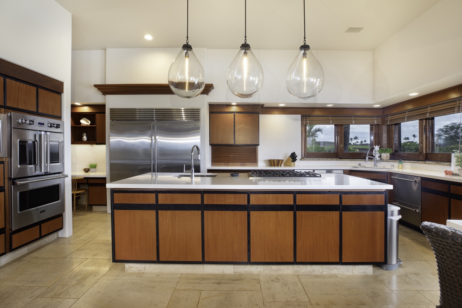 Kamuela Vacation Rentals, Champion Ridge 7 - Your gourmet kitchen features premium stainless steel appliances and spacious island for memorable cooking experiences.