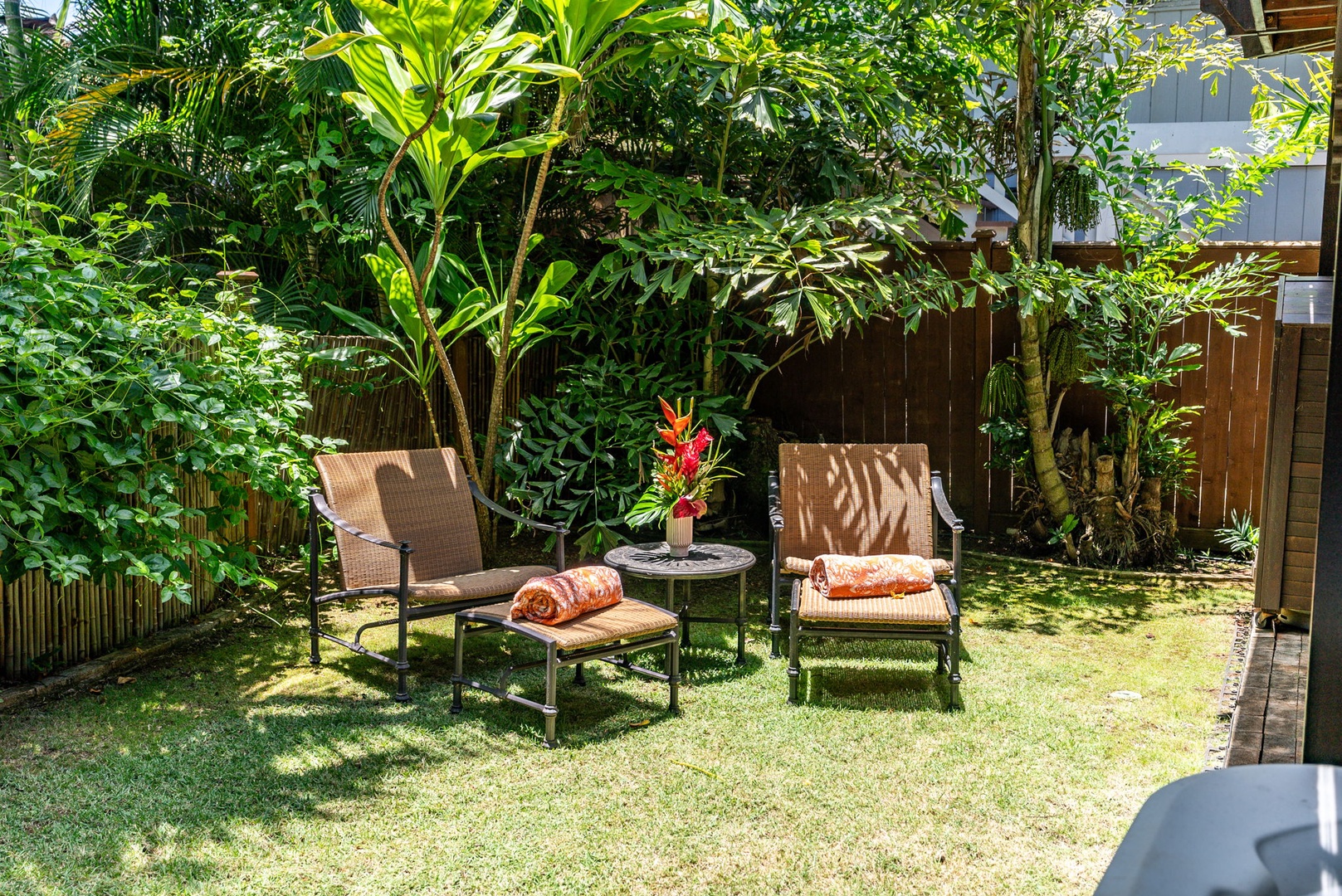 Haleiwa Vacation Rentals, Kealoha Tropical Beach Villa - Relax in the garden's cozy seating area with a cool drink.