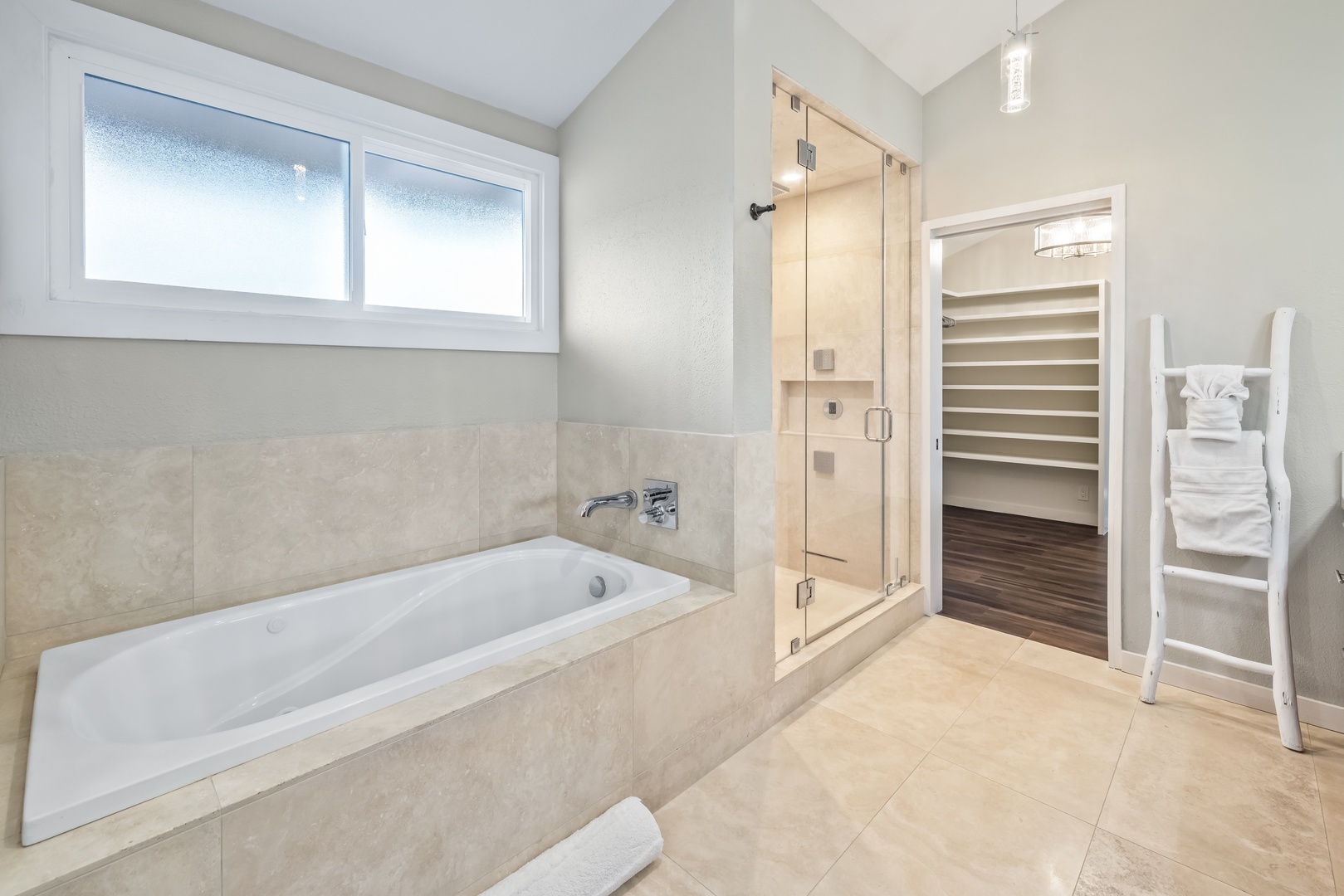 Honolulu Vacation Rentals, Nanea Kai Villa - Spa-like ensuite with a soaking tub, walk-in shower, and modern finishes.