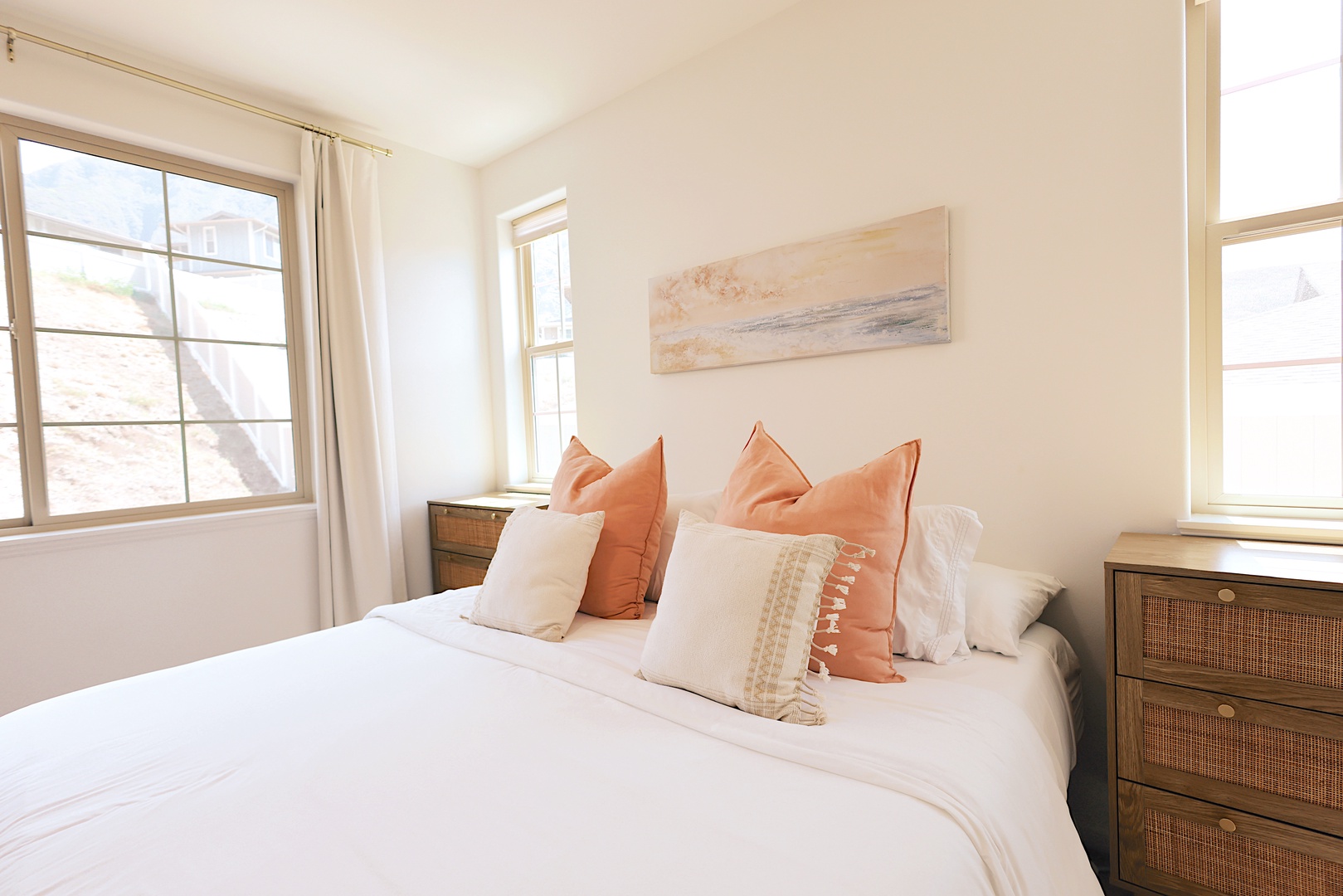 Makaha Valley Vacation Rentals, Makaha Vista Retreat** - Wake up to peaceful mountain views in this cozy, well-lit queen bedroom.