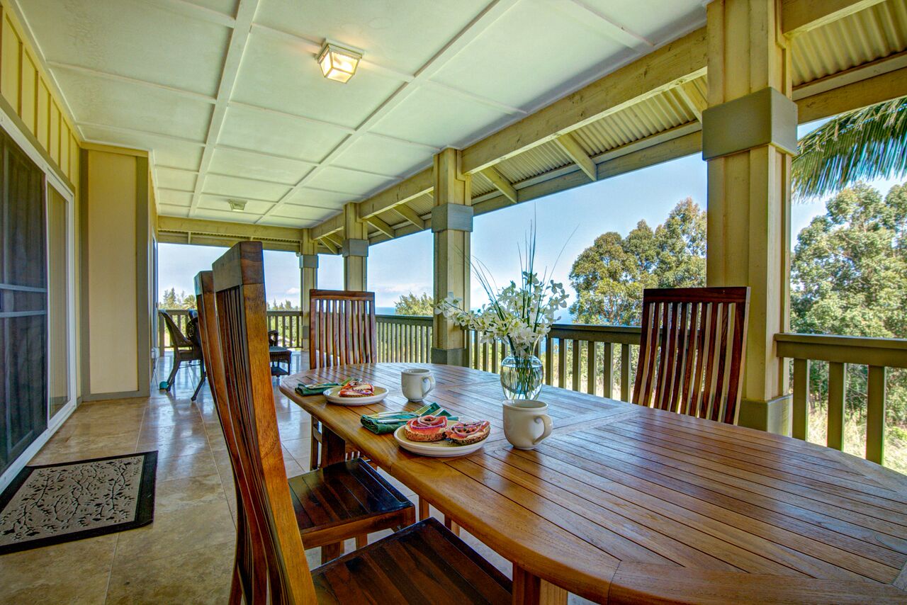 Honokaa Vacation Rentals, Hale Luana (Big Island) - The long back lanai has plenty of room for grilling and eating outside with seating for eight.