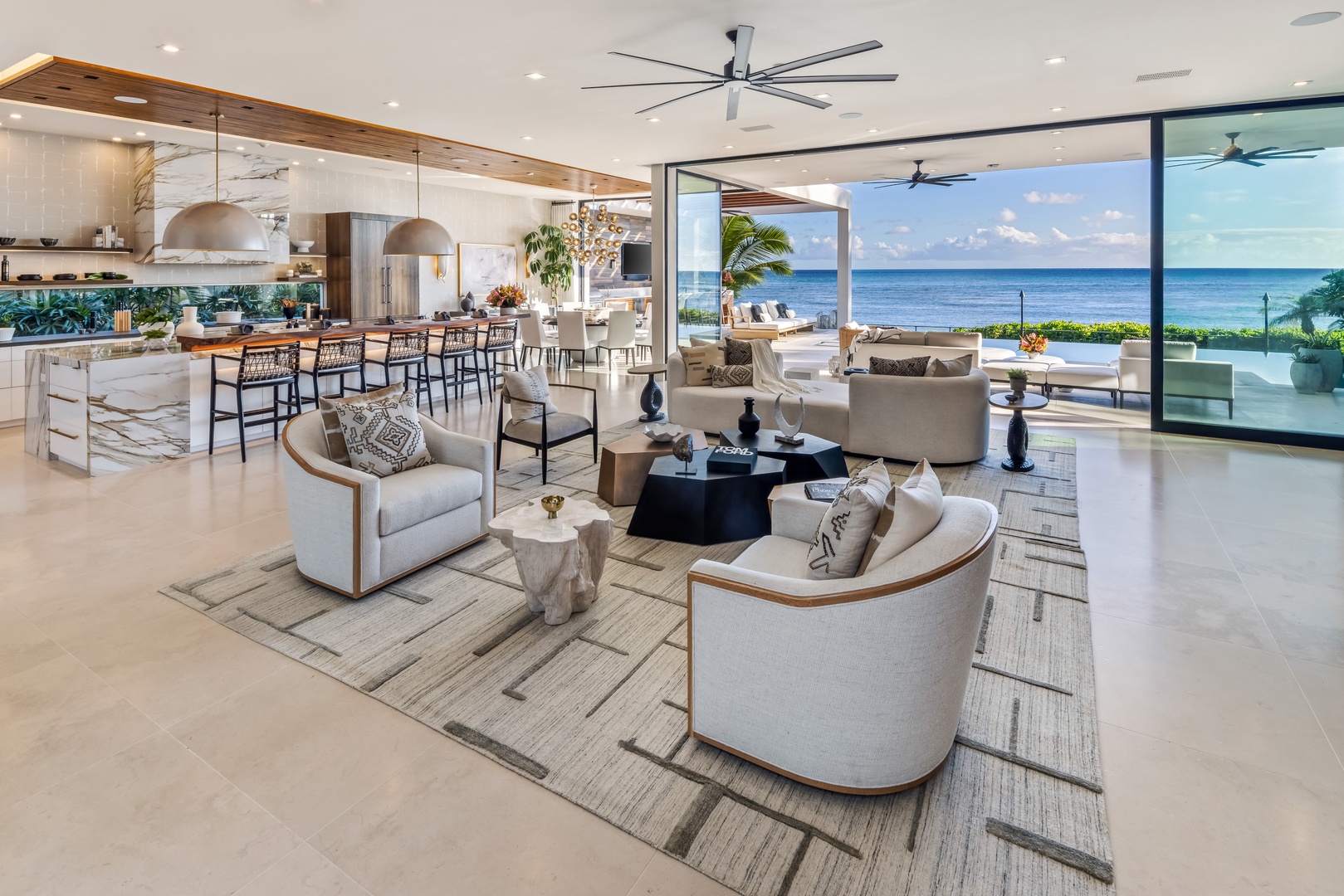 Honolulu Vacation Rentals, Diamond Head Grand Escape - Gather with family in the light-filled living space, where glass walls frame sweeping Pacific views.