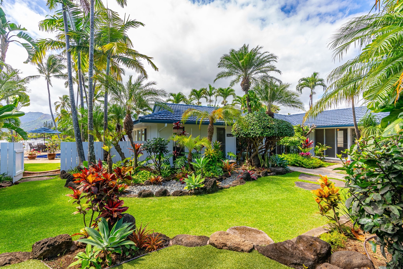 Kailua Vacation Rentals, Hale Aloha - Settled at the end of a serene cul-de-sac, surrounded by lush tropical flora.