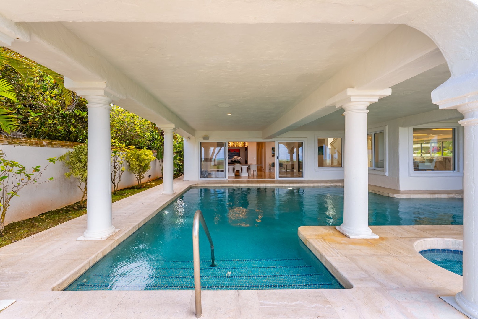 Kailua Vacation Rentals, Lanikai Sunrise Estate - Swim laps or soak in the private heated pool while enjoying shade and breezes under the columned terrace.
