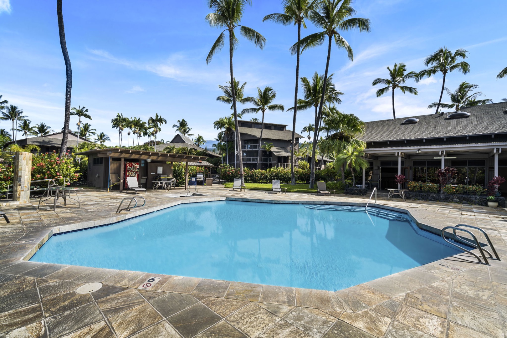 Kailua Kona Vacation Rentals, Kanaloa at Kona 1606 - Palms lean over yet another pool, quiet in the afternoon sun.