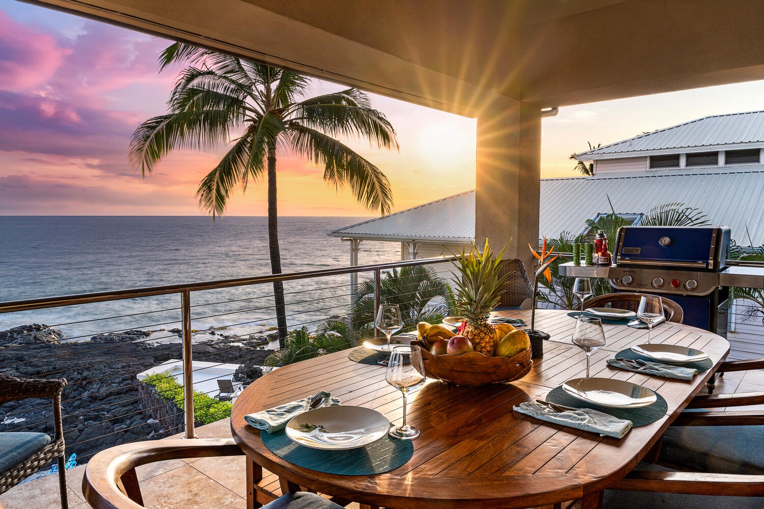 Kailua Kona Vacation Rentals, Kailani Vista - All 8 guests may greet the morning with fresh fruit and Kona coffee on the alfresco dining table, palm-framed panoramas setting the day’s tropical tone.