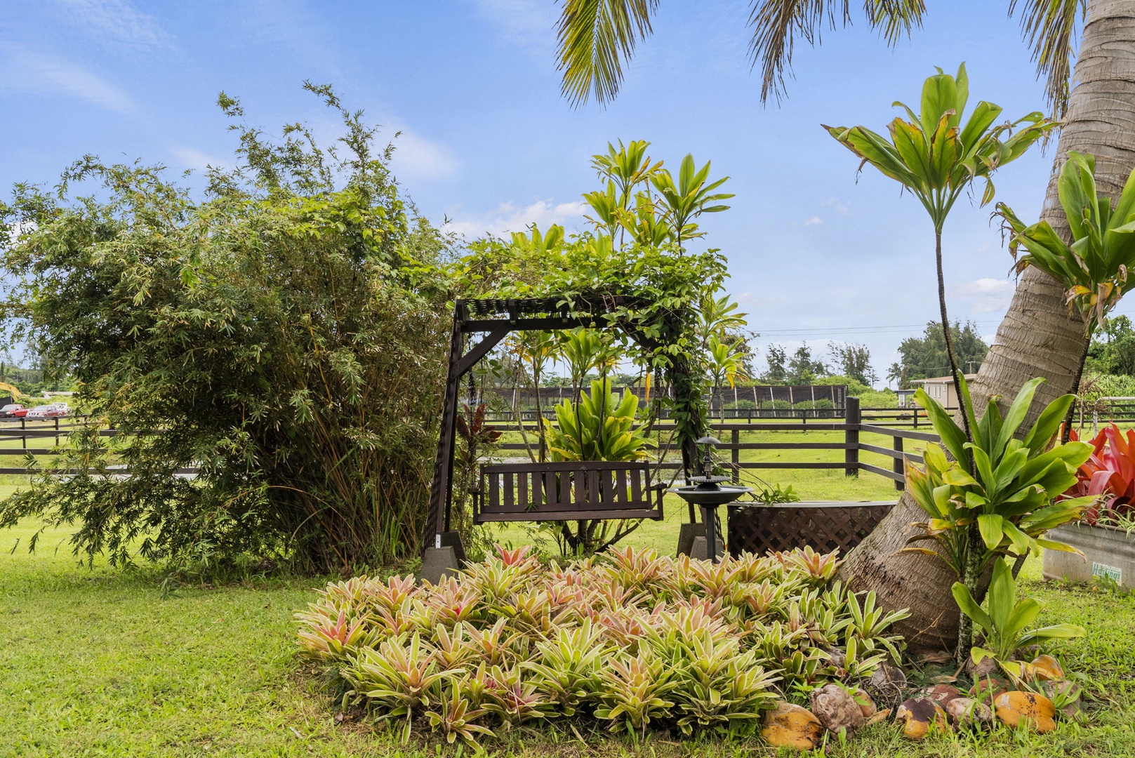 Hauula Vacation Rentals, Mau Loa Hale - Relaxing swing and amazing landscapting