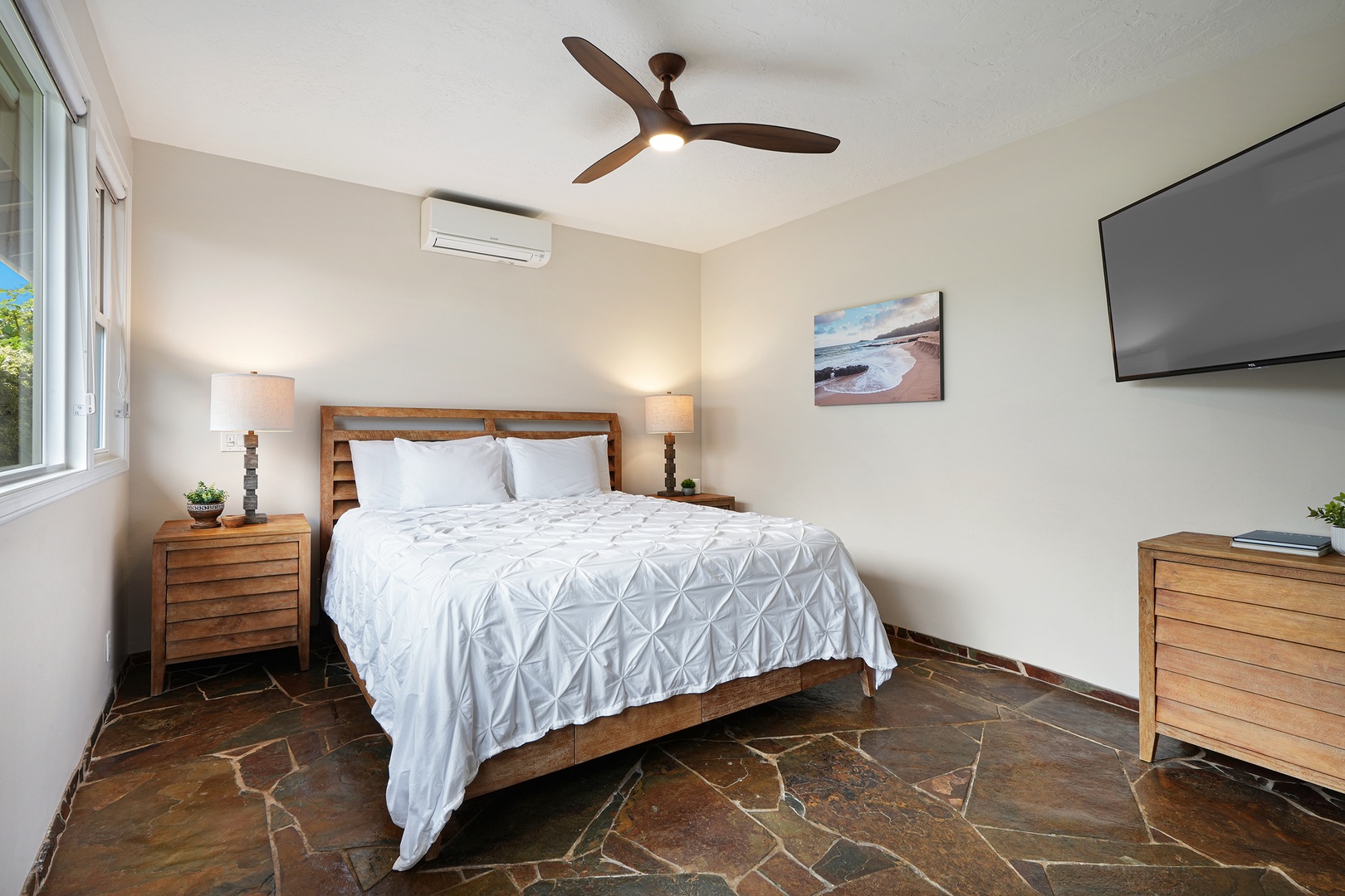 Princeville Vacation Rentals, Pohaku Villa - Rest peacefully in your cozy bedroom with crisp linens, gentle ceiling fan breeze, and modern comforts for the perfect night's sleep.