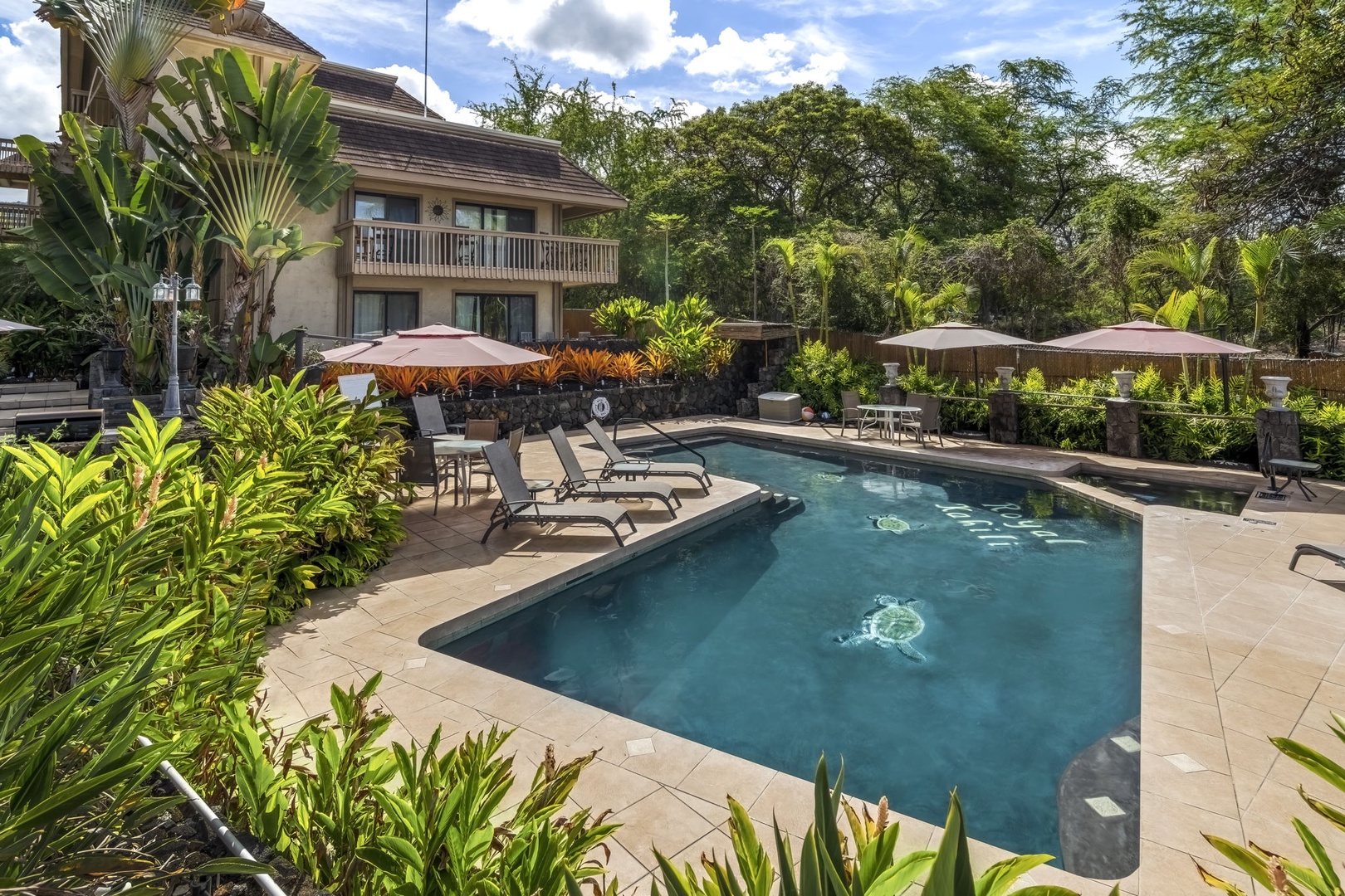 Kailua Kona Vacation Rentals, Royal Kahili 401A - Relaxing pool area and lush greenery all around.