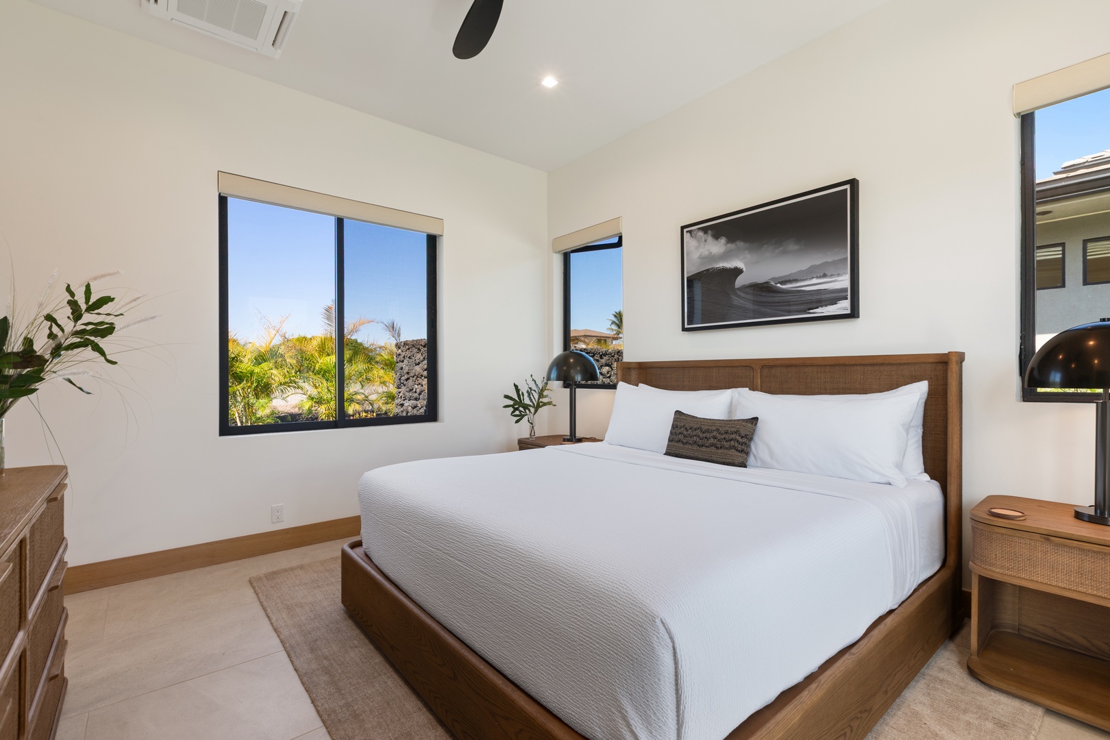 Kamuela Vacation Rentals, 5BD Mauna Lani Lux Ocean Estate (OE12) at One Ocean - Wake up in your serene bedroom sanctuary with pristine white linens and tropical garden views streaming through oversized windows.